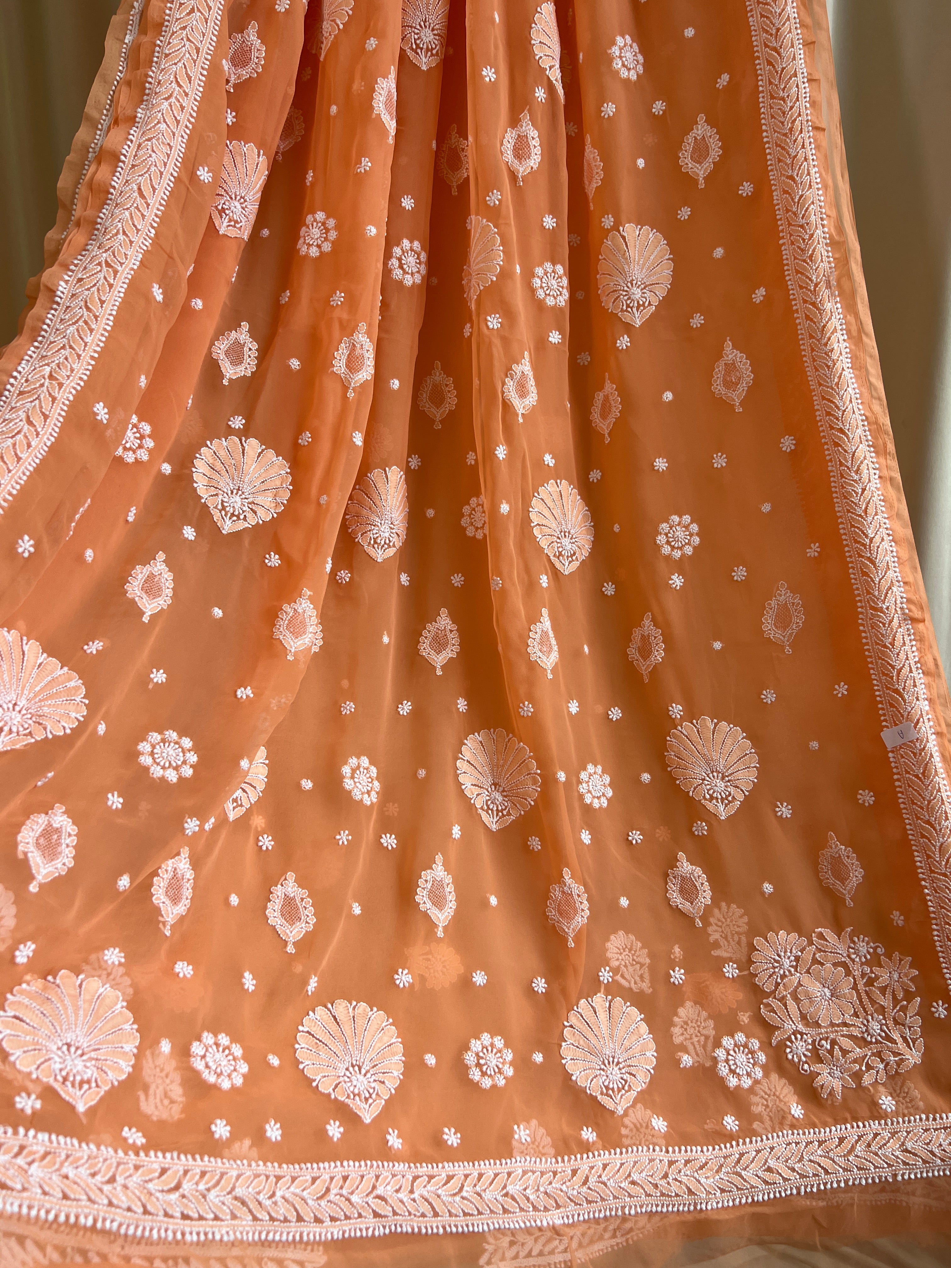 Georgette Chikankari saree in Sunset Orange ARIAA CHIKANKARI
