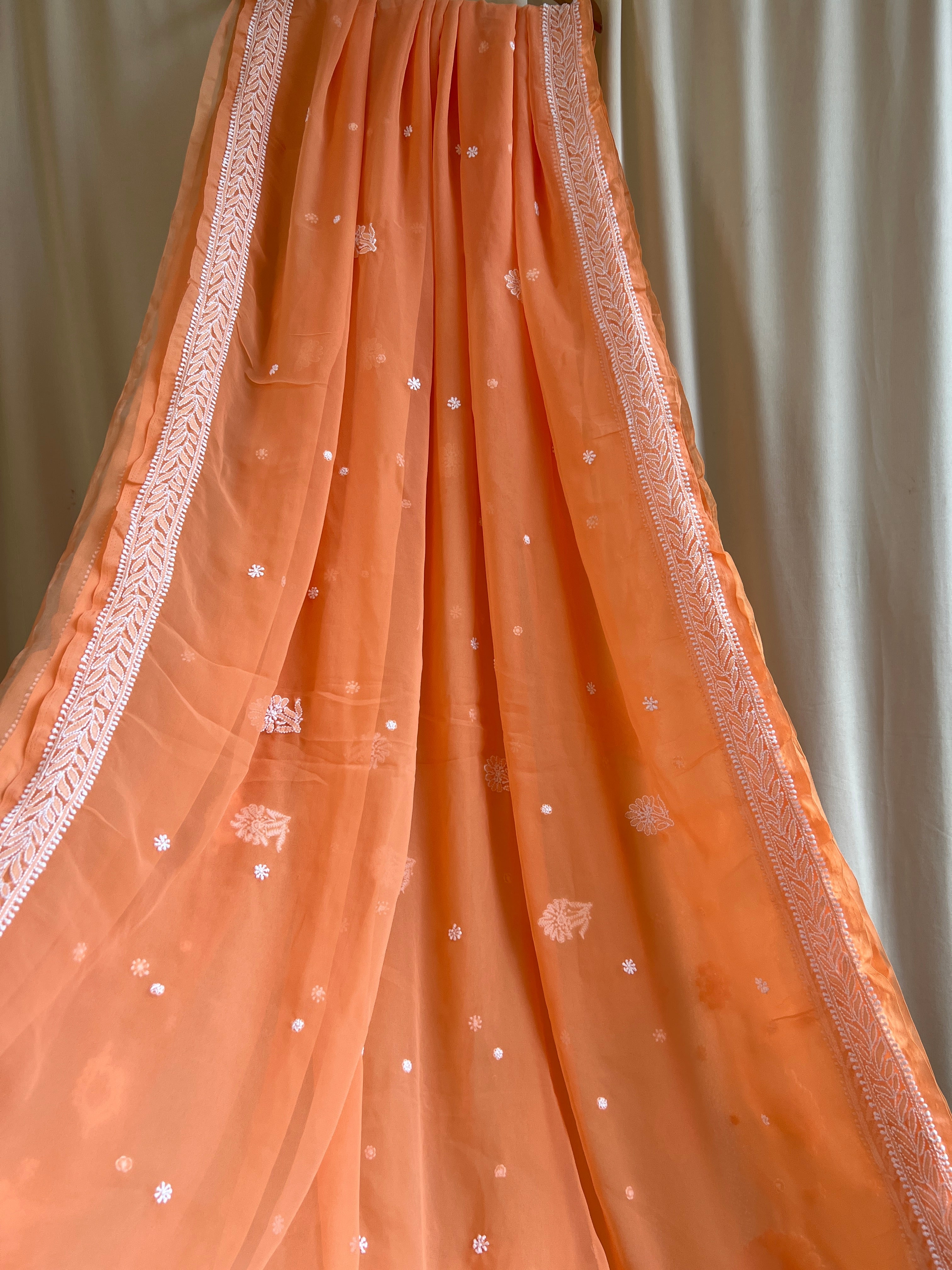 Georgette Chikankari saree in Sunset Orange ARIAA CHIKANKARI