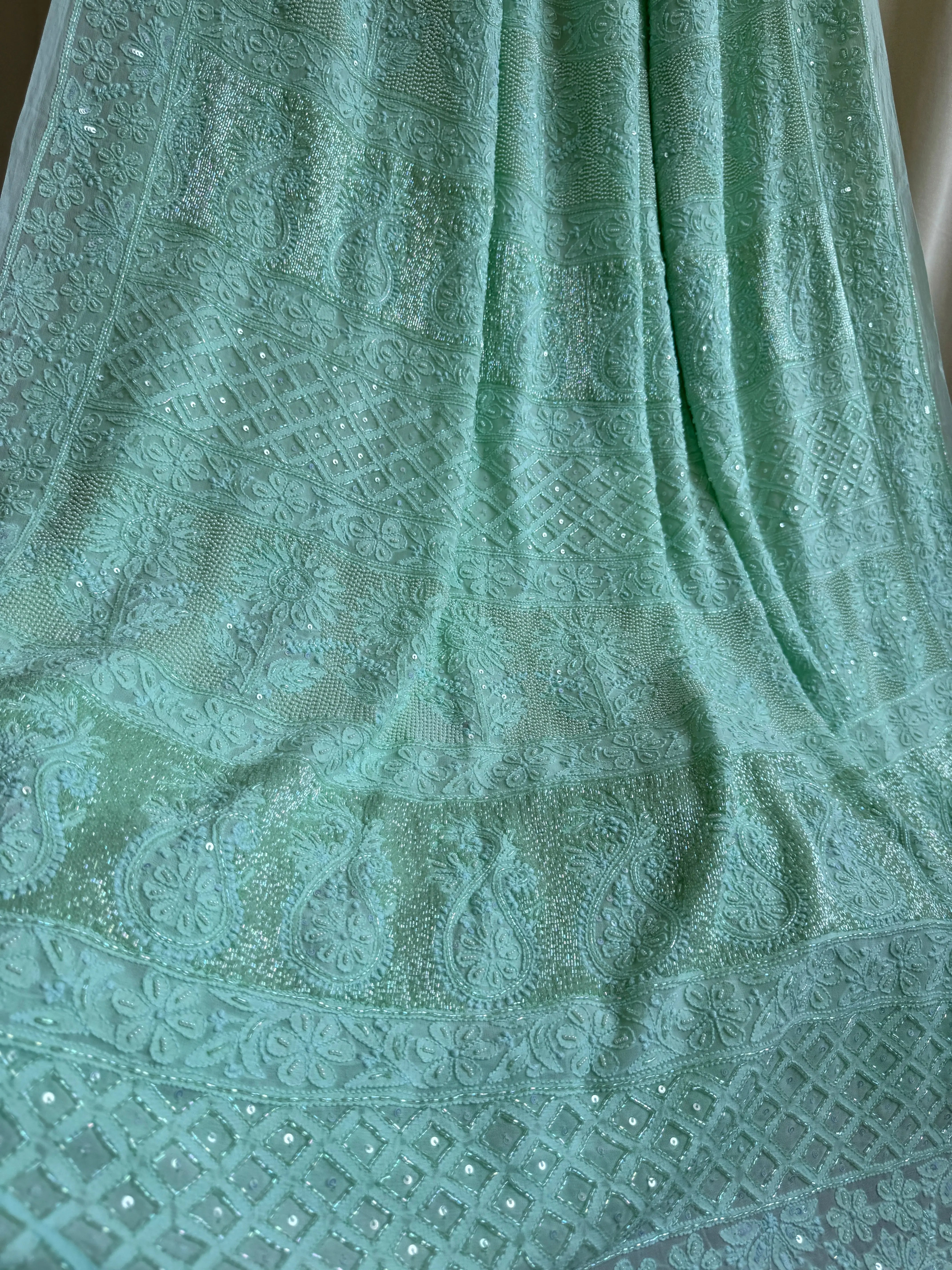 Green Chikankari saree with Pearl embellishments ARIAA CHIKANKARI