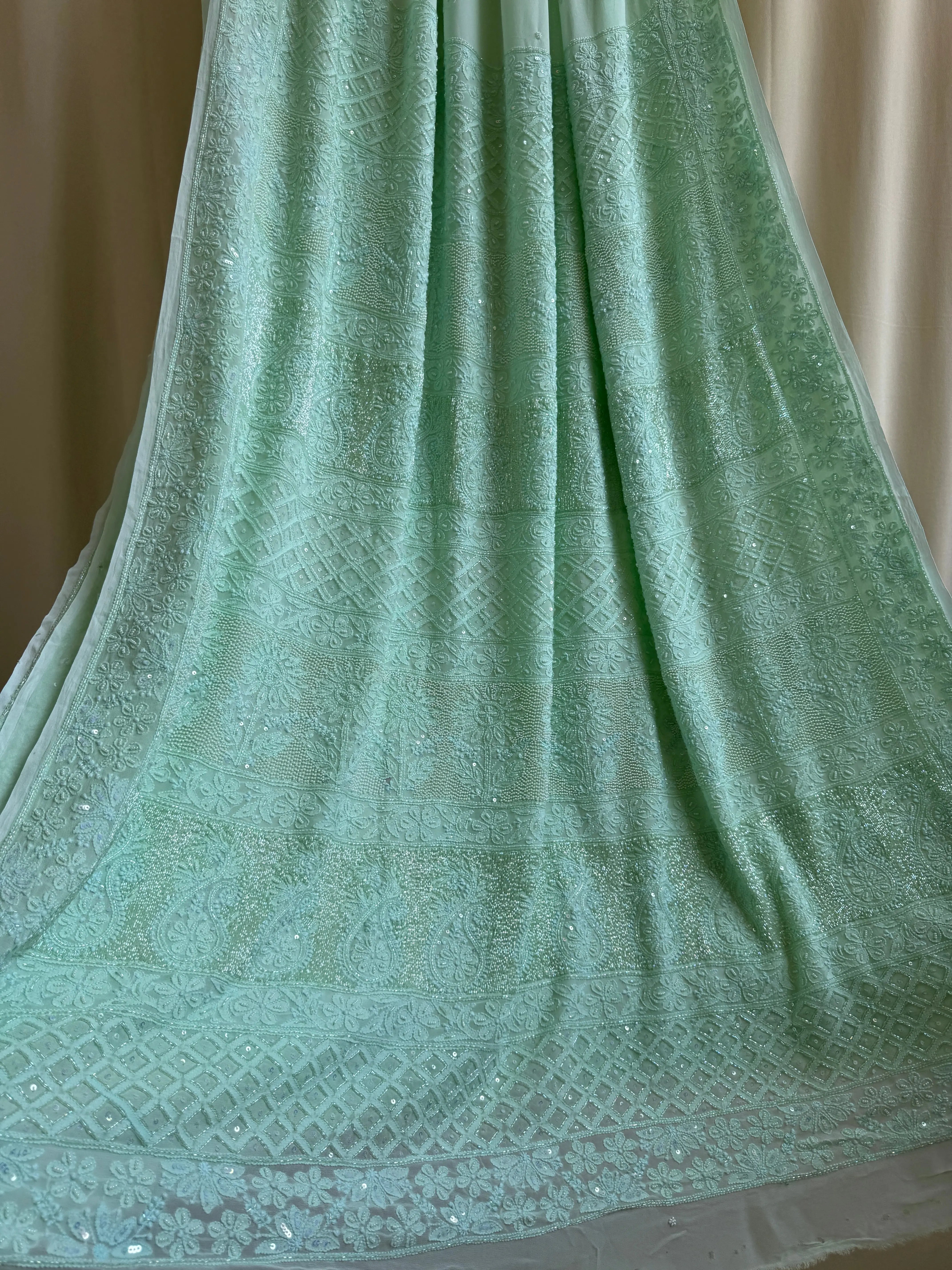 Green Chikankari saree with Pearl embellishments ARIAA CHIKANKARI