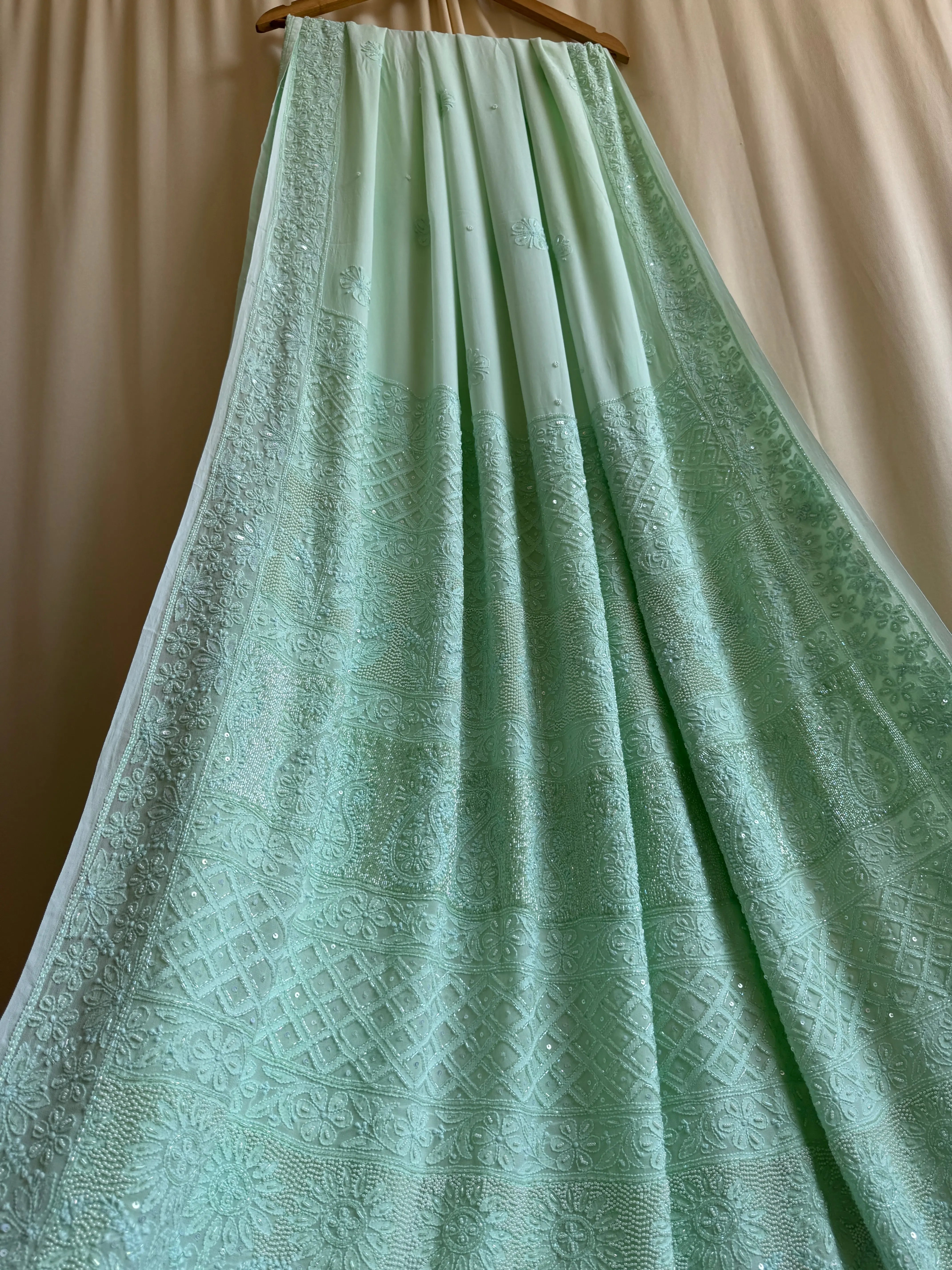 Green Chikankari saree with Pearl embellishments ARIAA CHIKANKARI