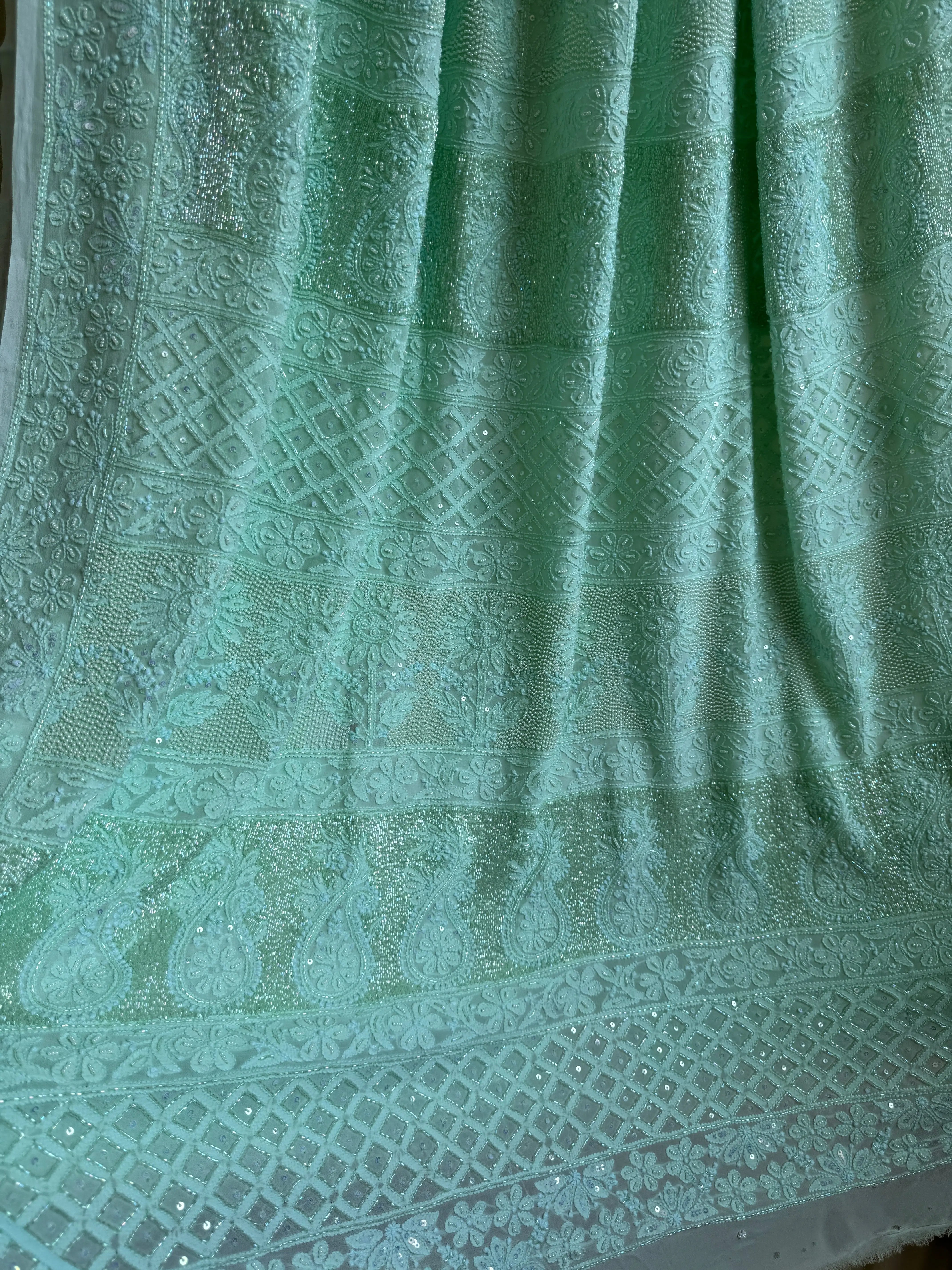 Green Chikankari saree with Pearl embellishments ARIAA CHIKANKARI