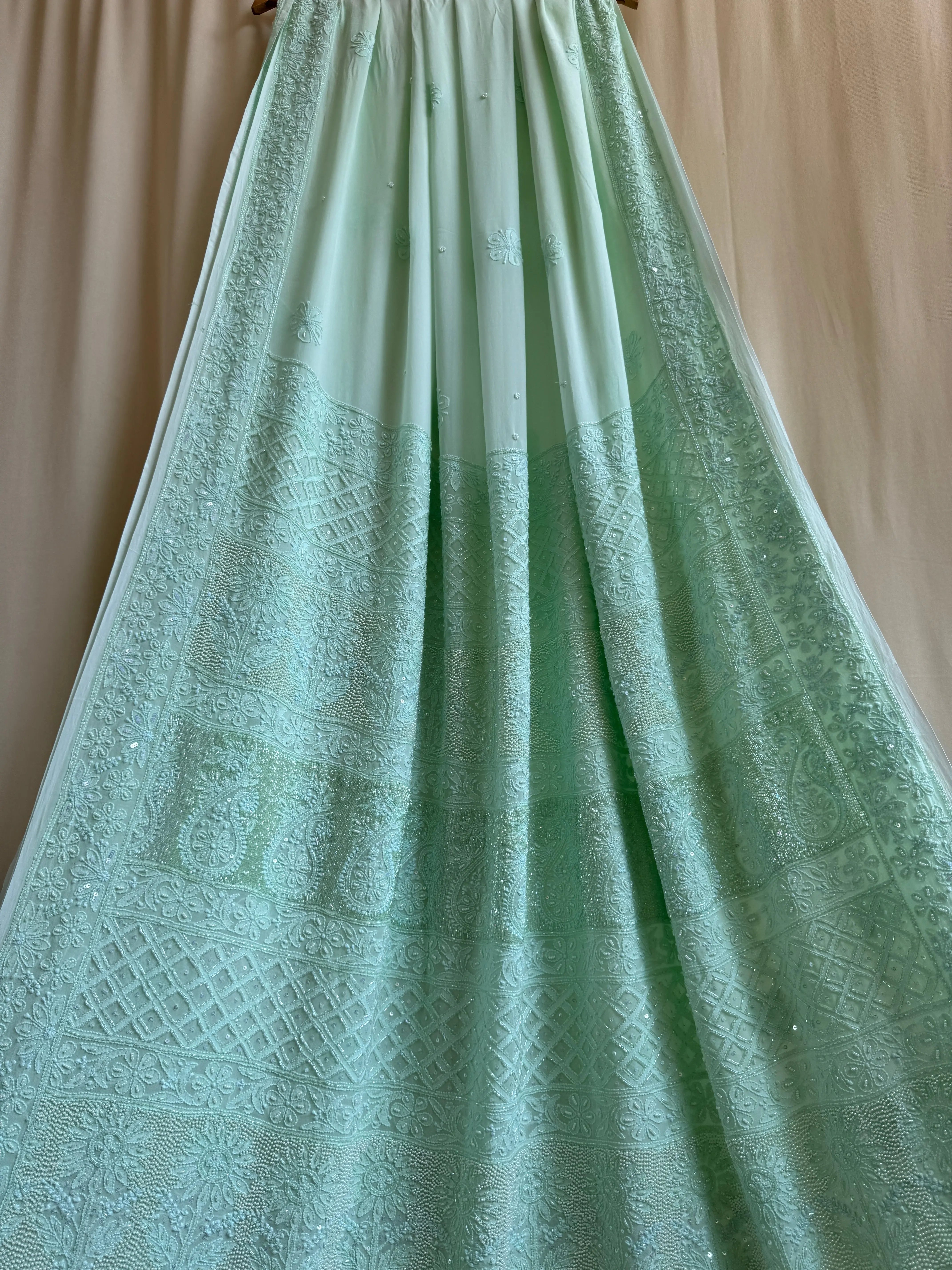 Green Chikankari saree with Pearl embellishments ARIAA CHIKANKARI