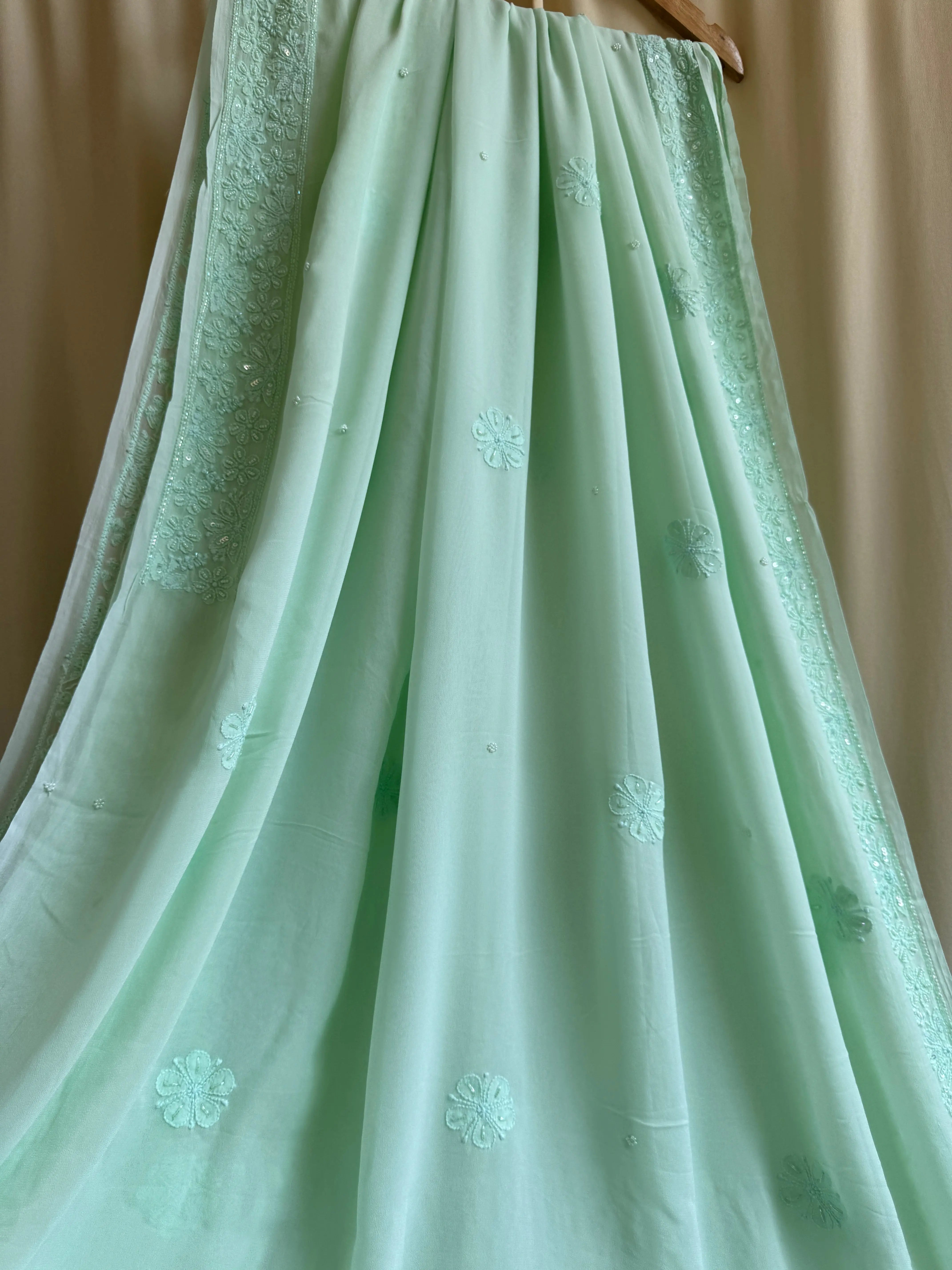 Green Chikankari saree with Pearl embellishments ARIAA CHIKANKARI