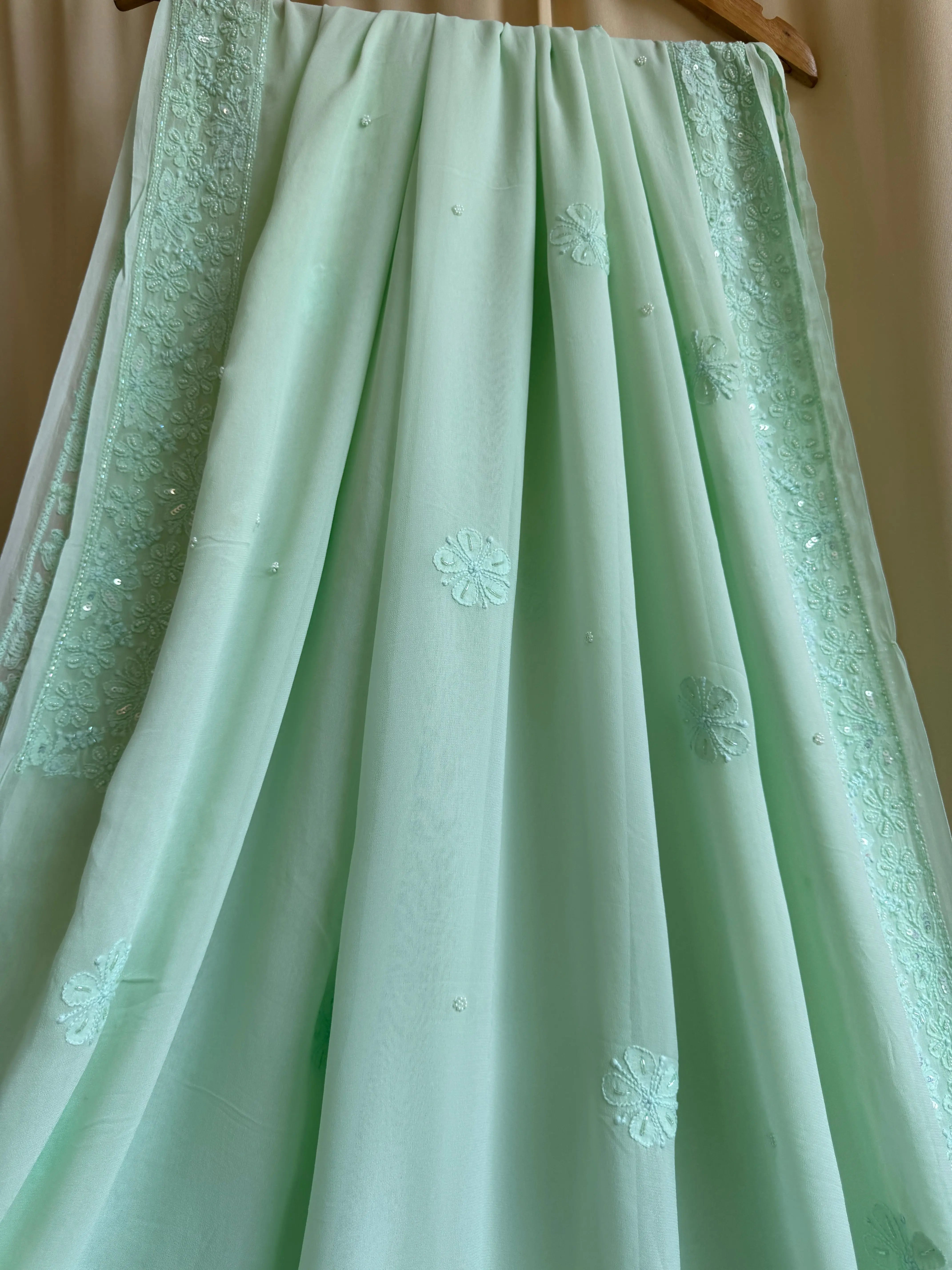Green Chikankari saree with Pearl embellishments ARIAA CHIKANKARI