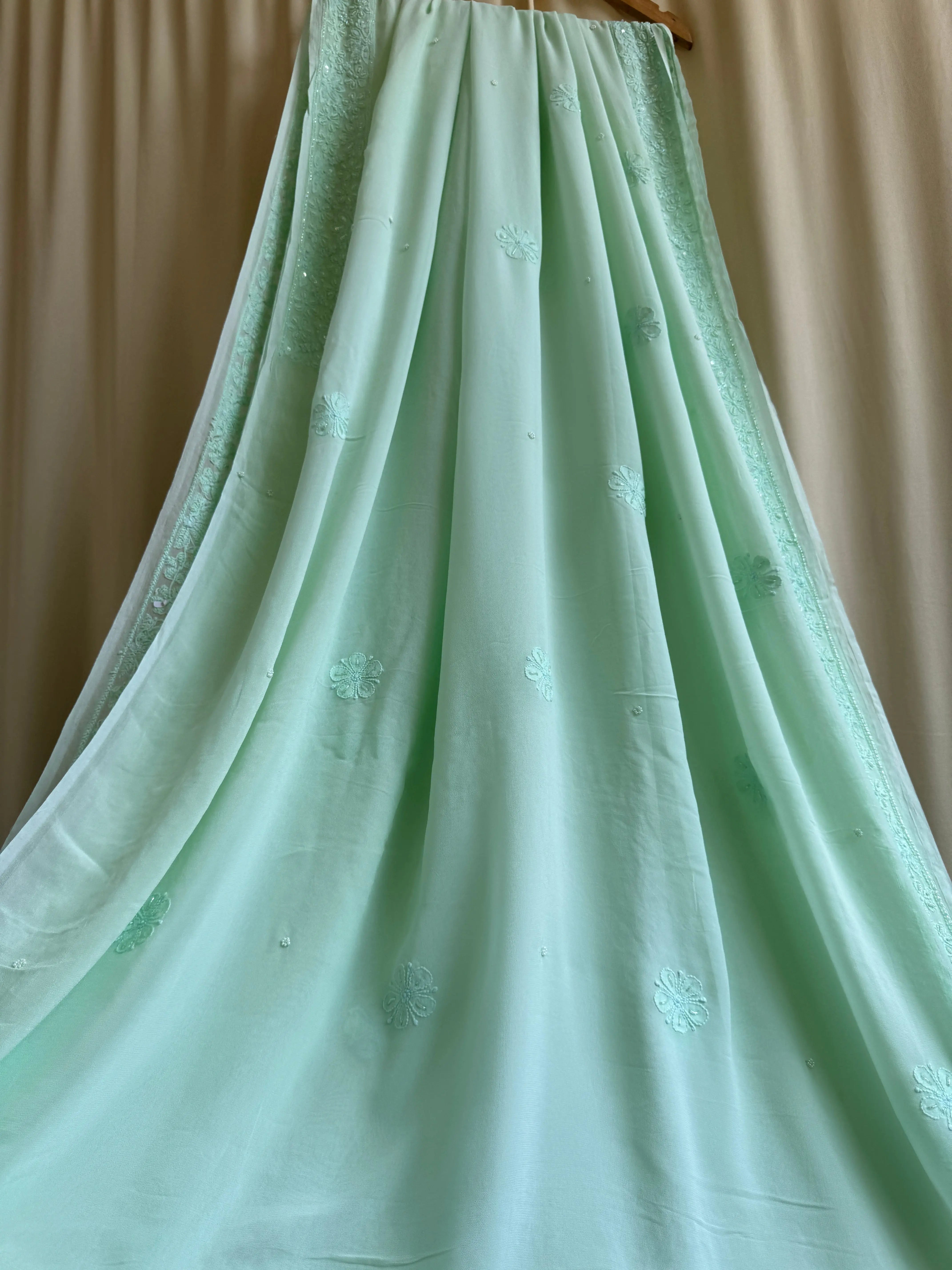 Green Chikankari saree with Pearl embellishments ARIAA CHIKANKARI