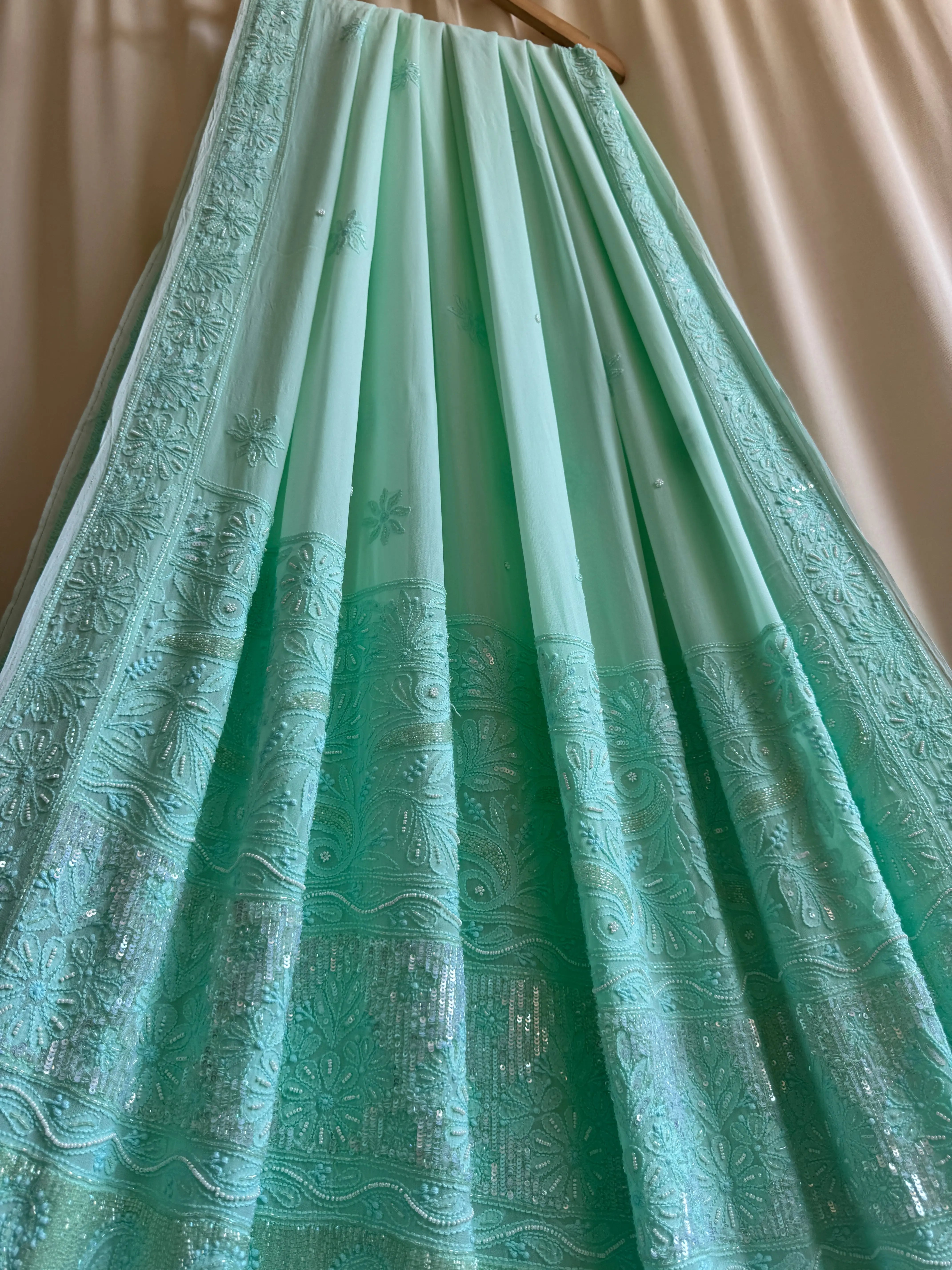 Green Chikankari saree with Pearl embellishments ARIAA CHIKANKARI