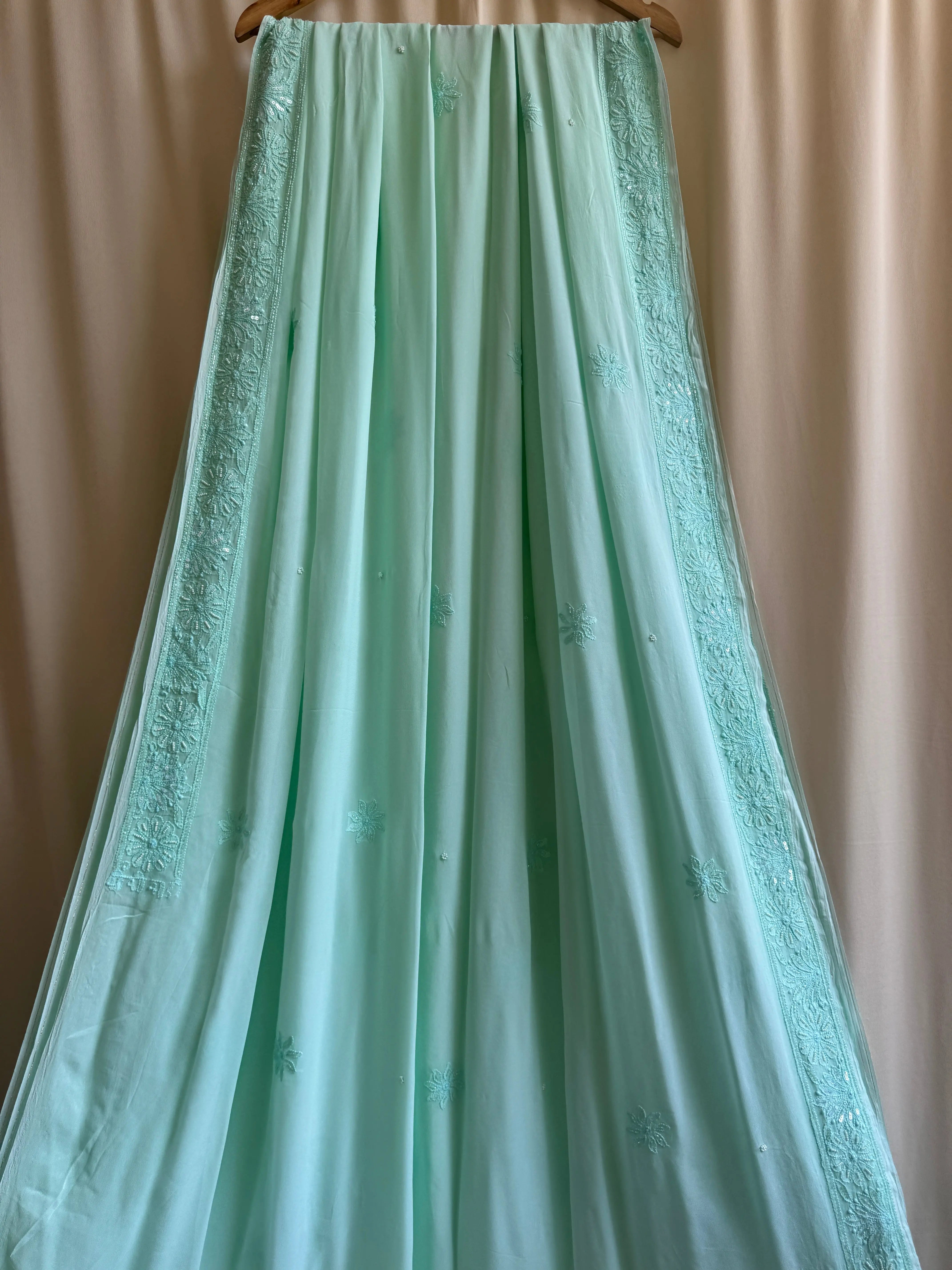 Green Chikankari saree with Pearl embellishments ARIAA CHIKANKARI