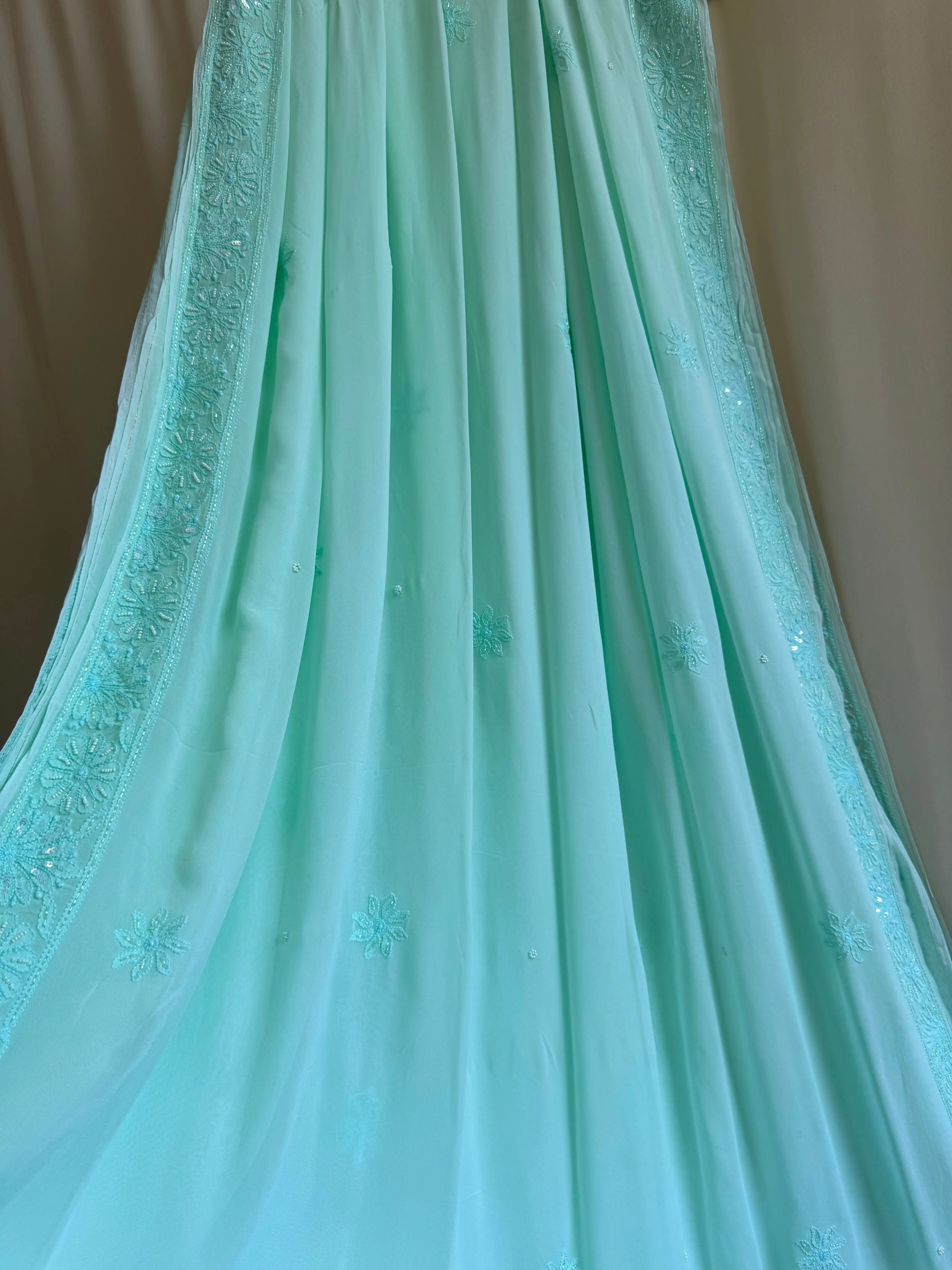 Green Chikankari saree with Pearl embellishments ARIAA CHIKANKARI