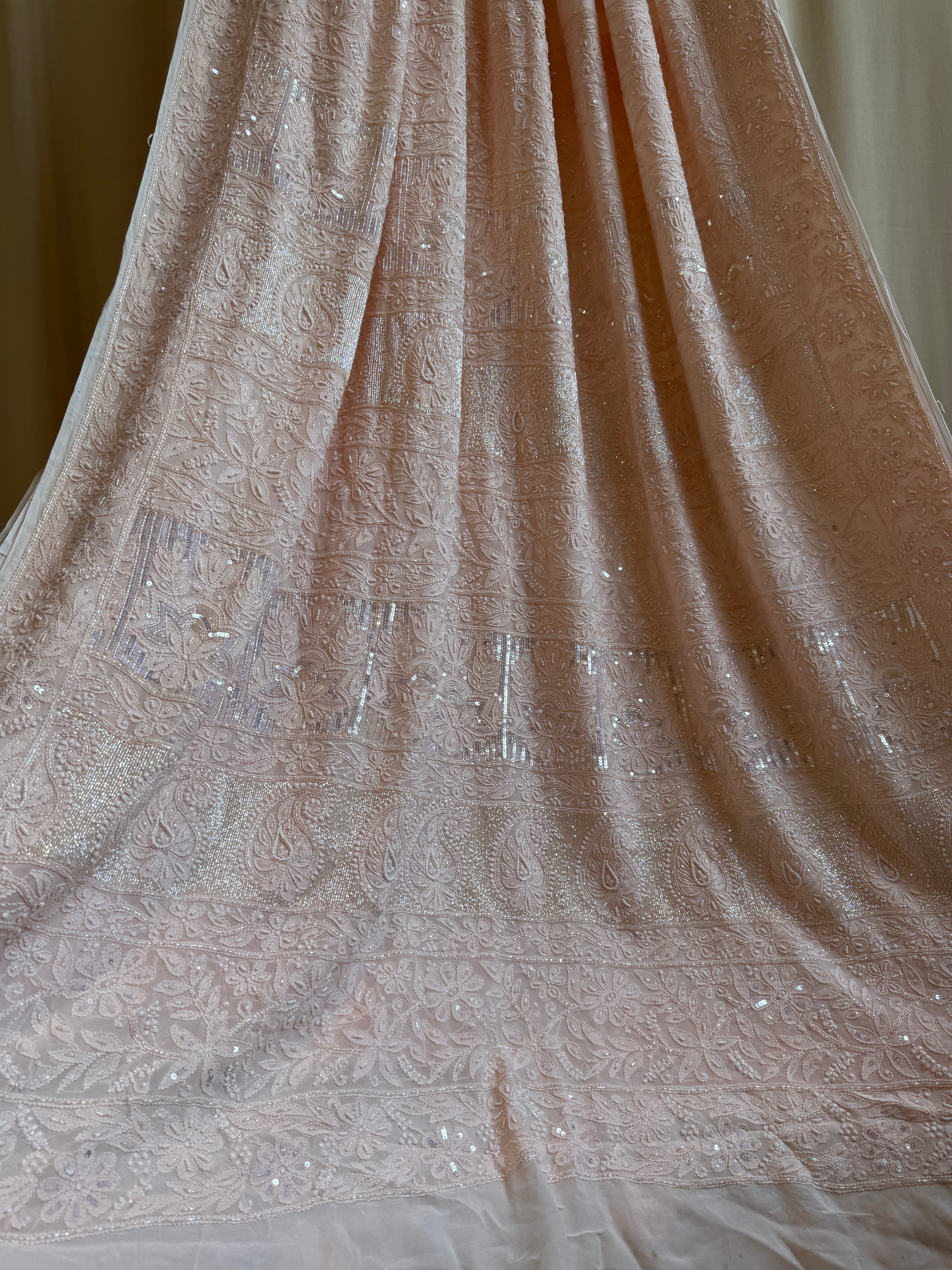 Viscose Peach Chikankari saree with Pearl embellishments