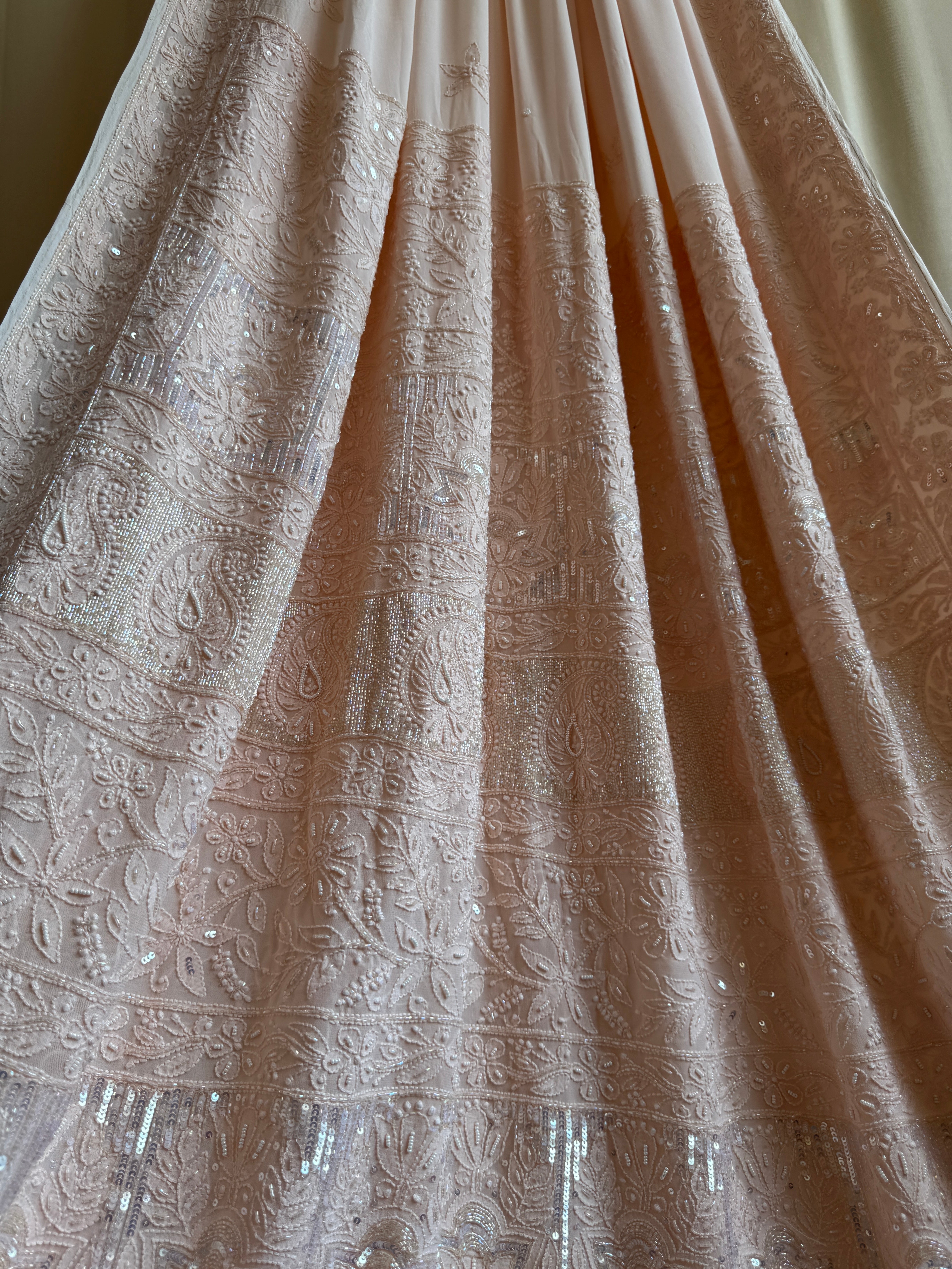Viscose Peach Chikankari saree with Pearl embellishments