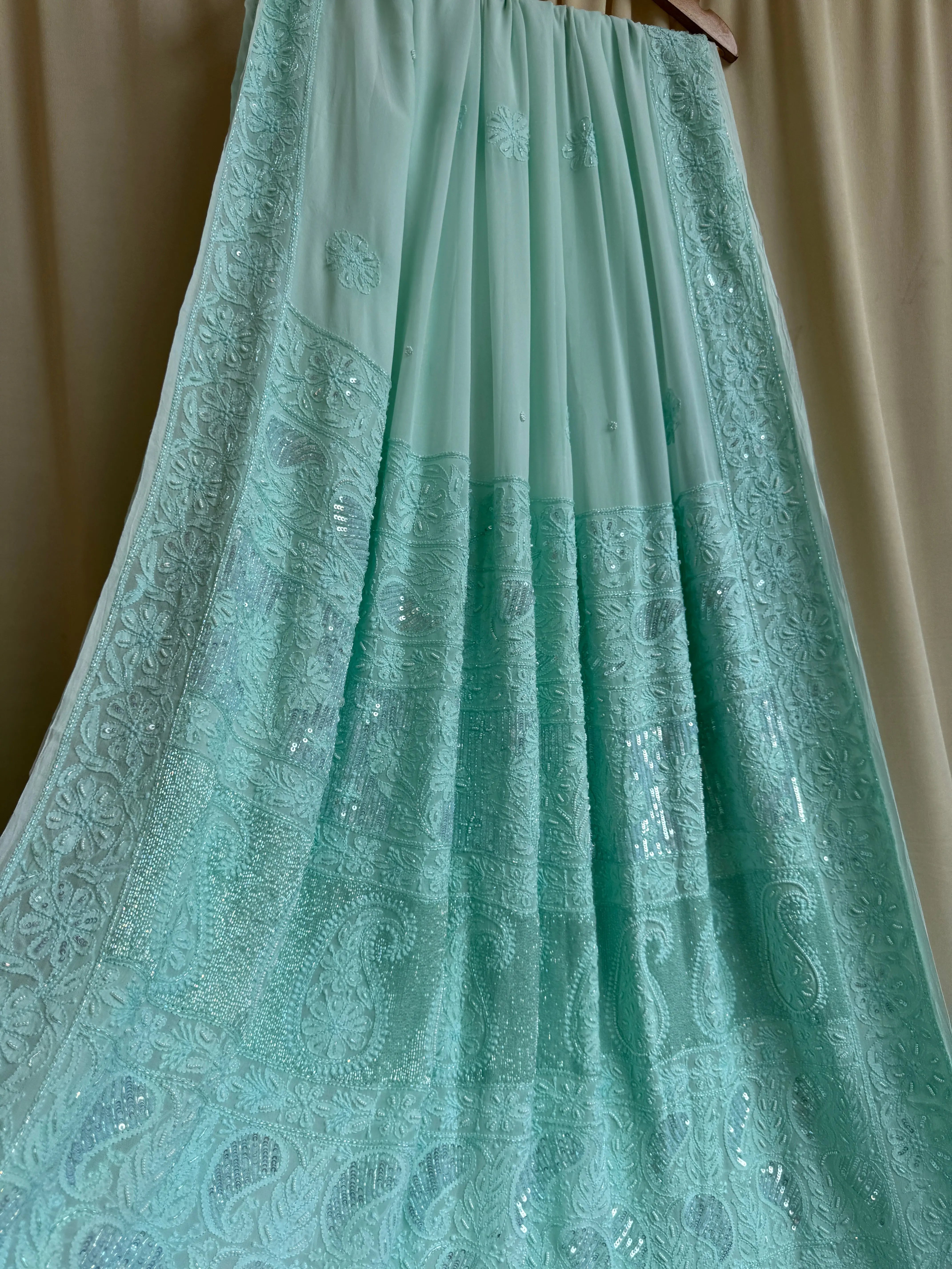 Viscose Green Chikankari saree with Pearl embellishments ARIAA CHIKANKARI