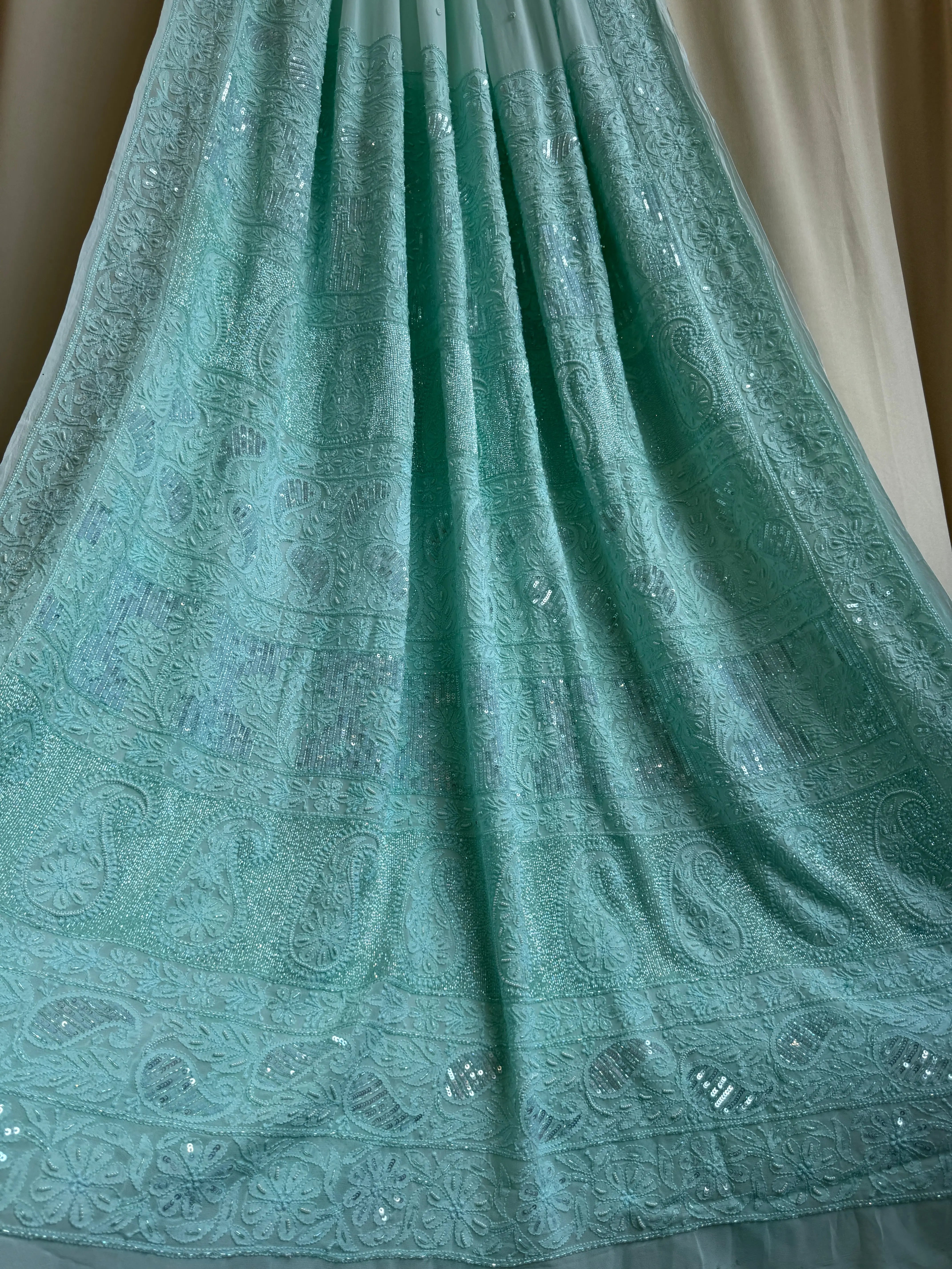 Viscose Green Chikankari saree with Pearl embellishments ARIAA CHIKANKARI