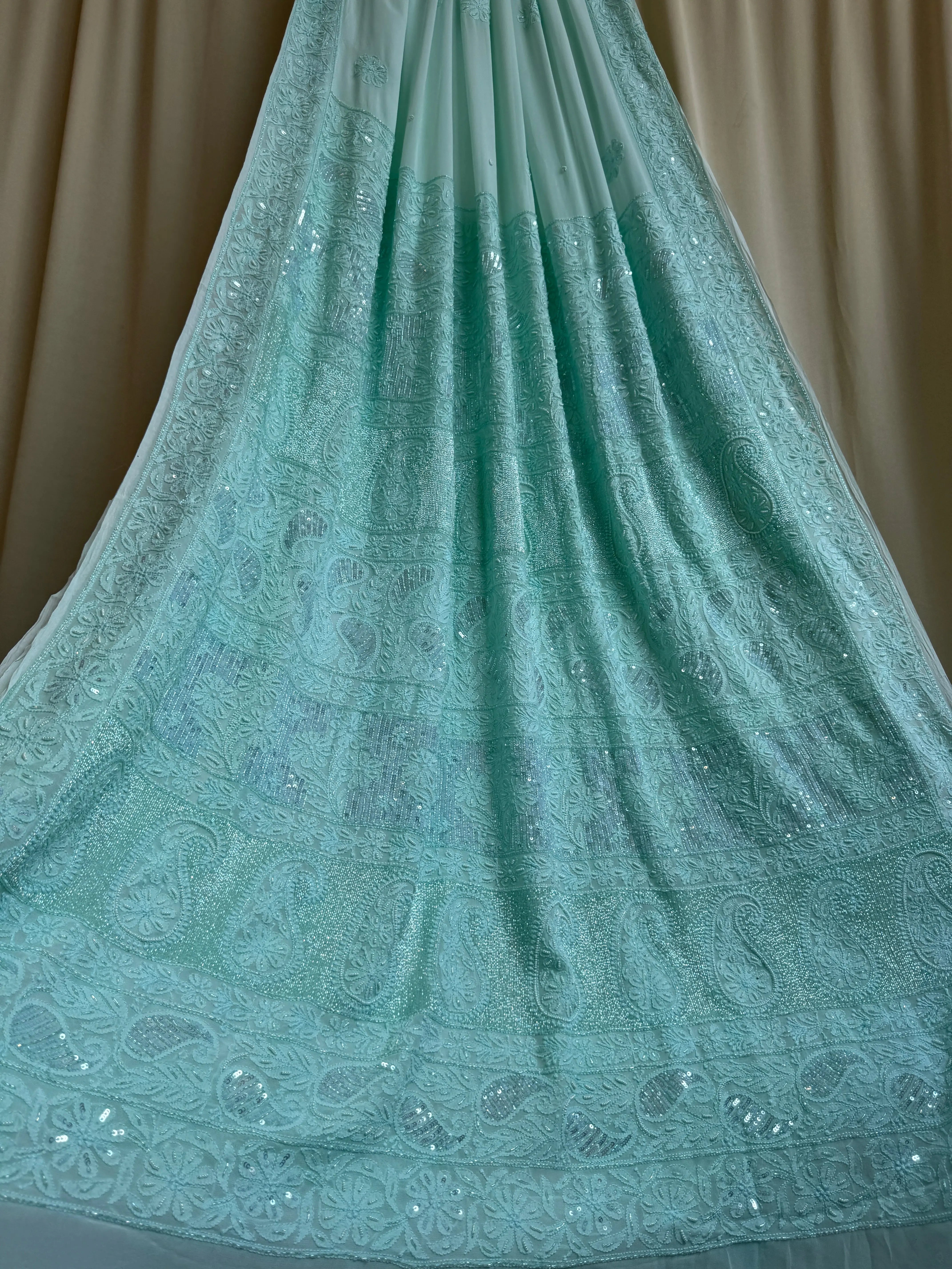 Viscose Green Chikankari saree with Pearl embellishments ARIAA CHIKANKARI