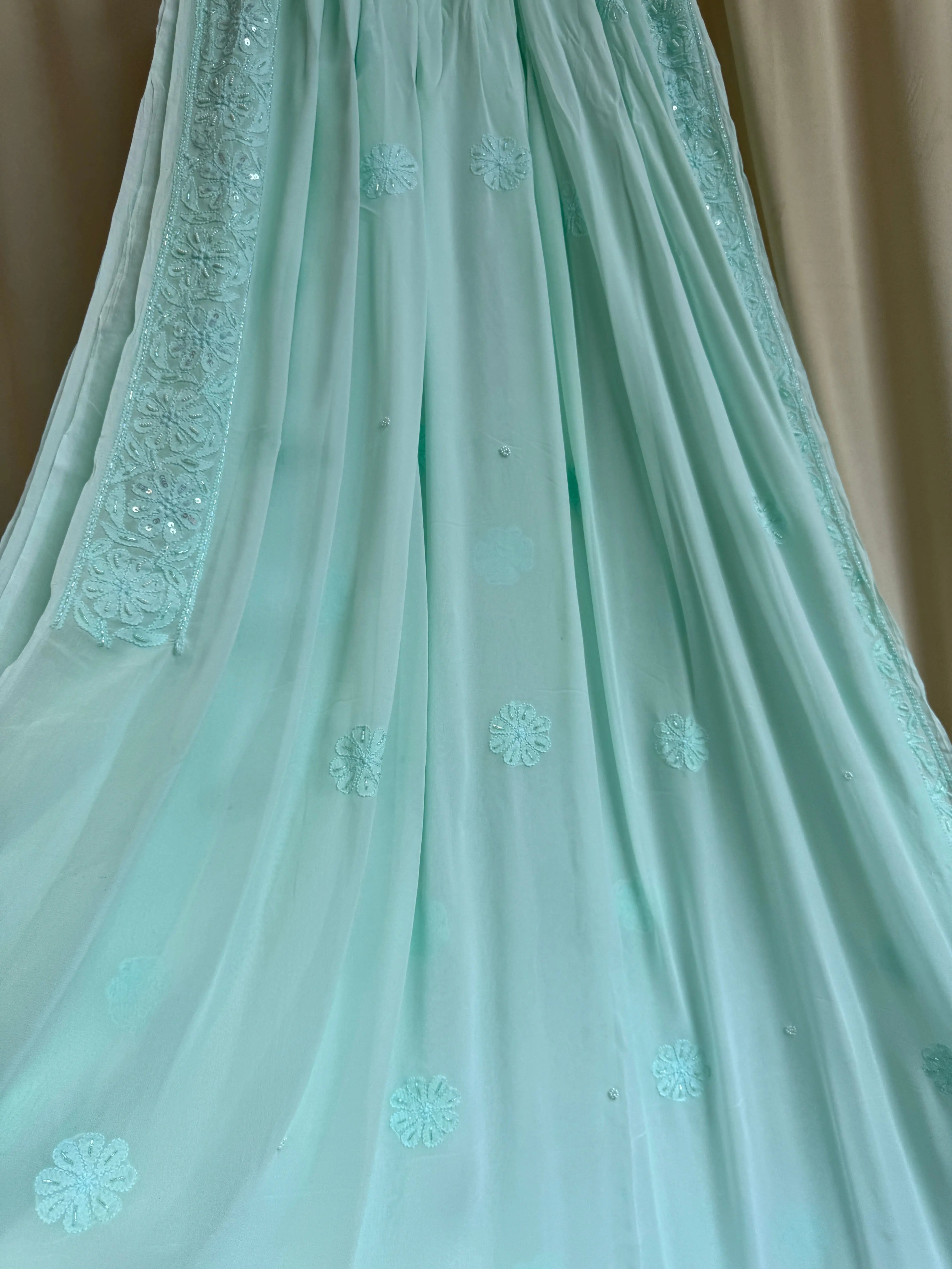 Viscose Green Chikankari saree with Pearl embellishments ARIAA CHIKANKARI