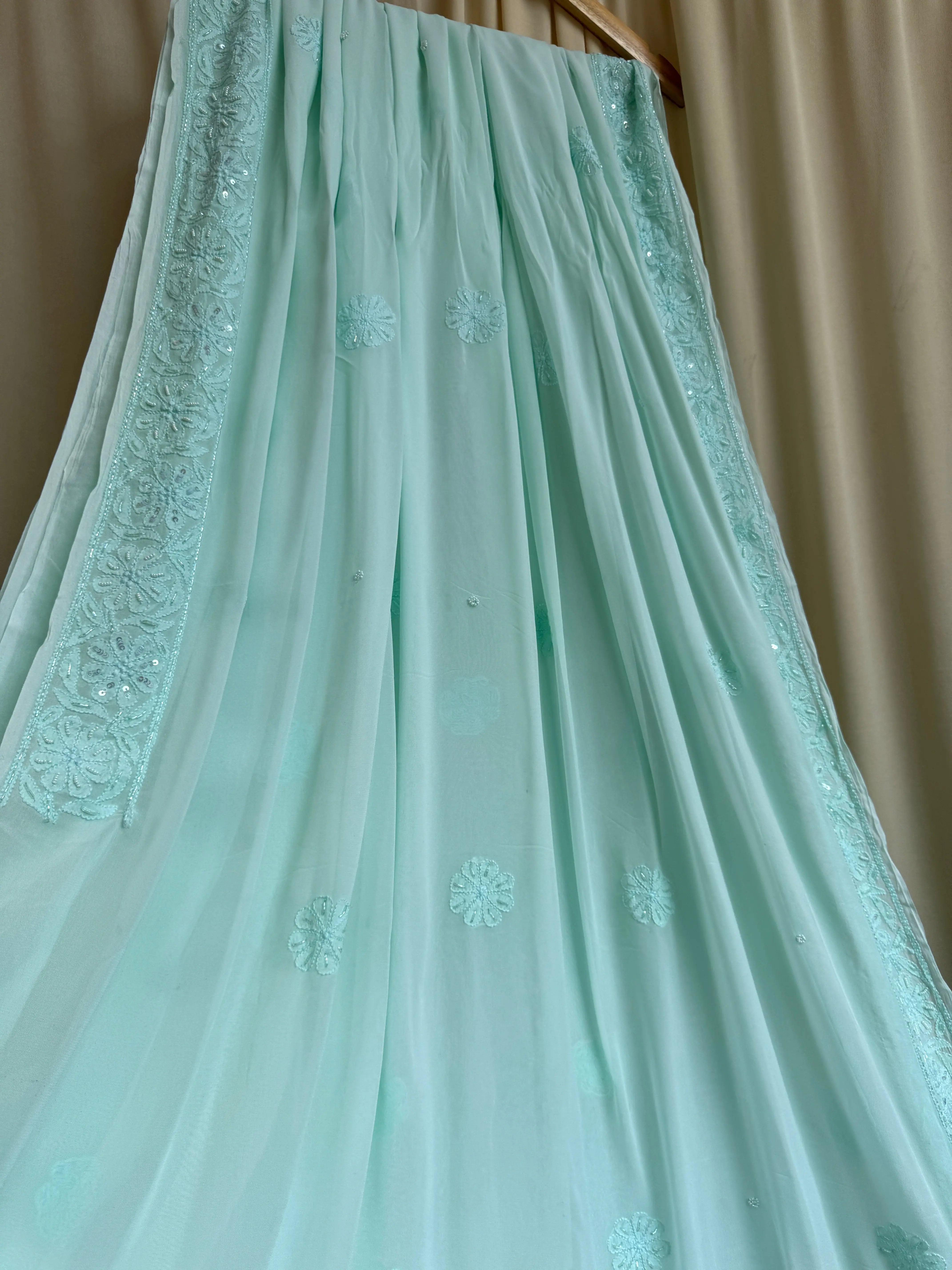 Viscose Green Chikankari saree with Pearl embellishments ARIAA CHIKANKARI