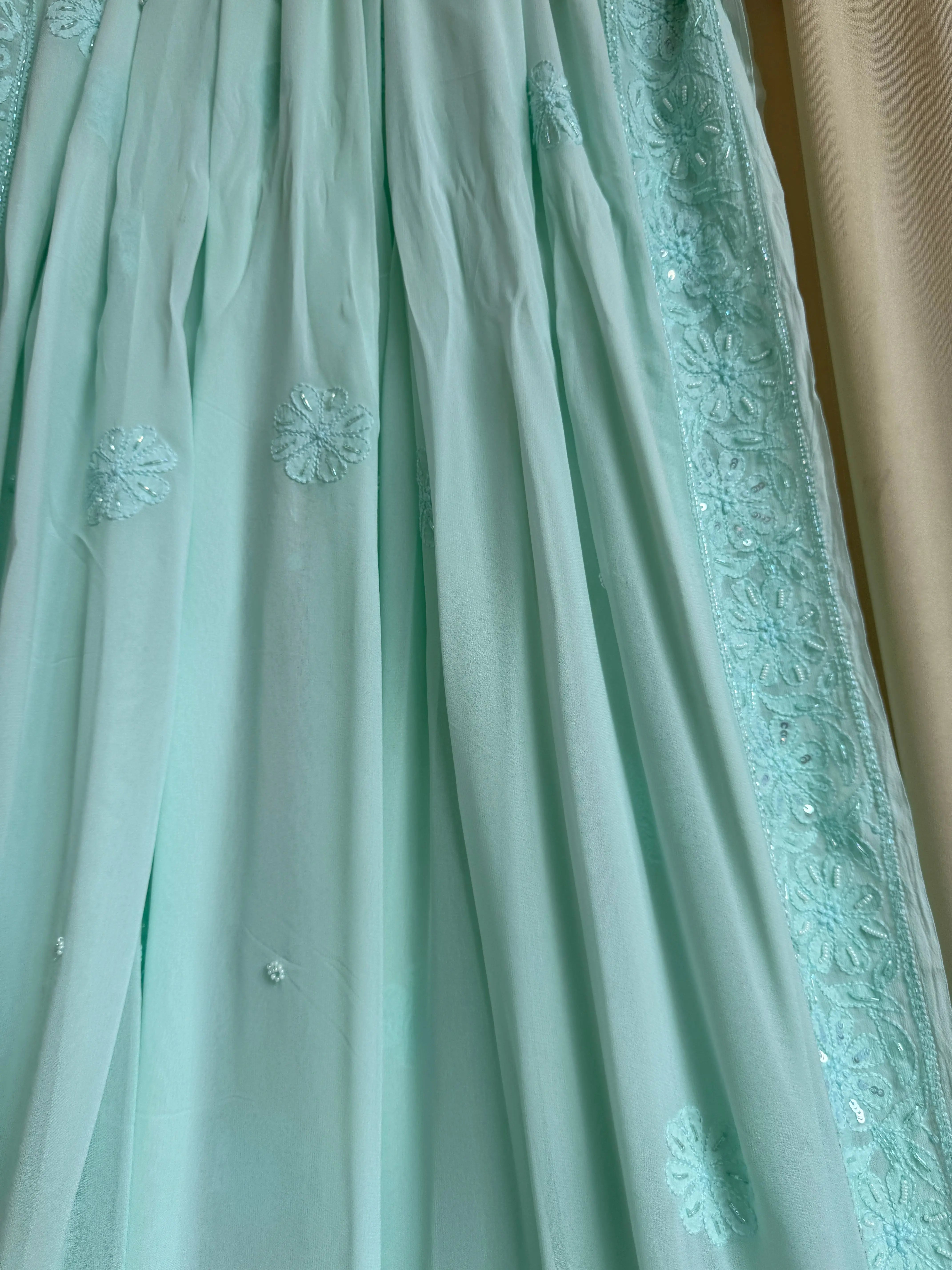 Viscose Green Chikankari saree with Pearl embellishments ARIAA CHIKANKARI