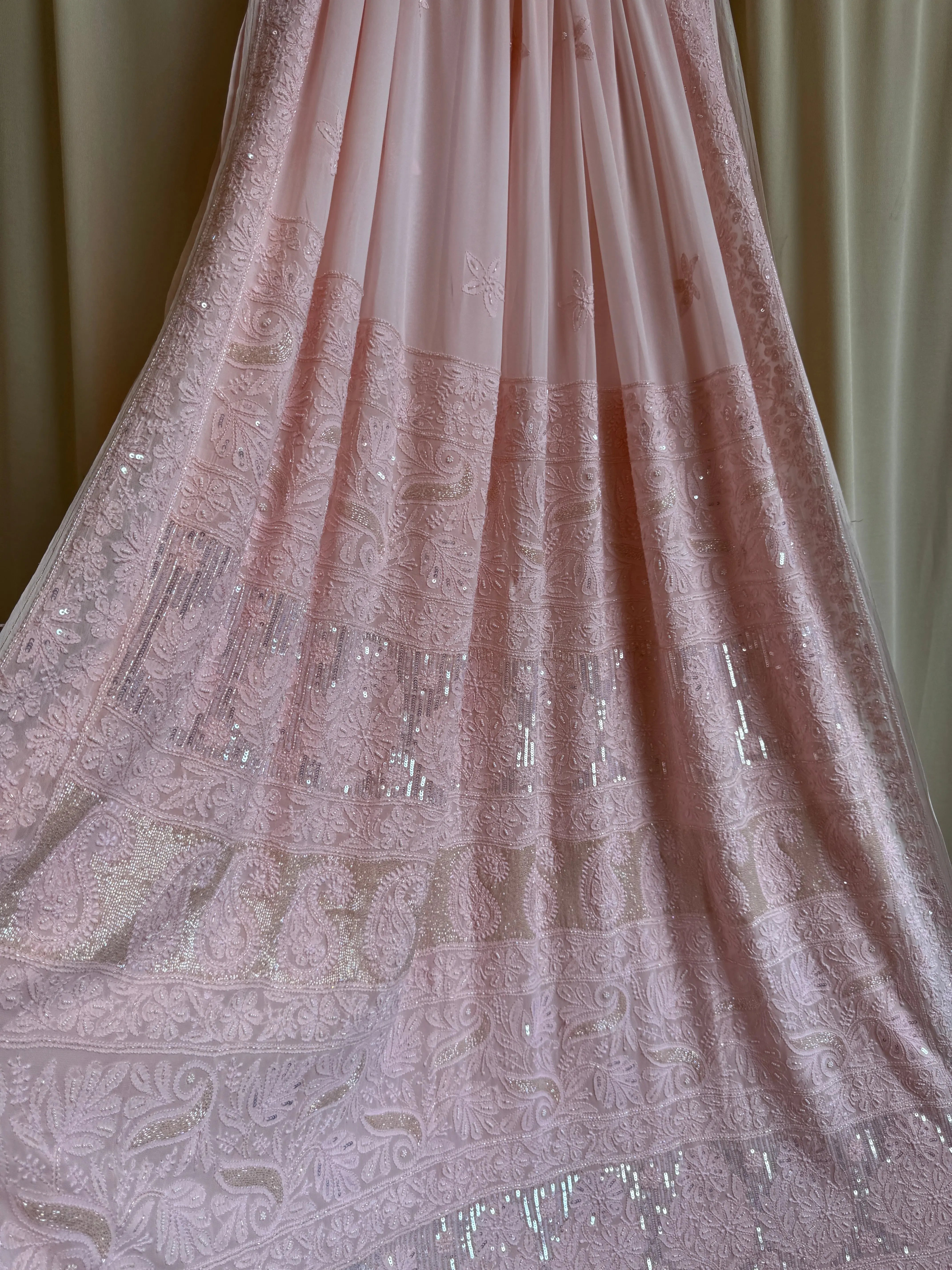 Viscose Peach Chikankari saree with Pearl embellishments ARIAA CHIKANKARI