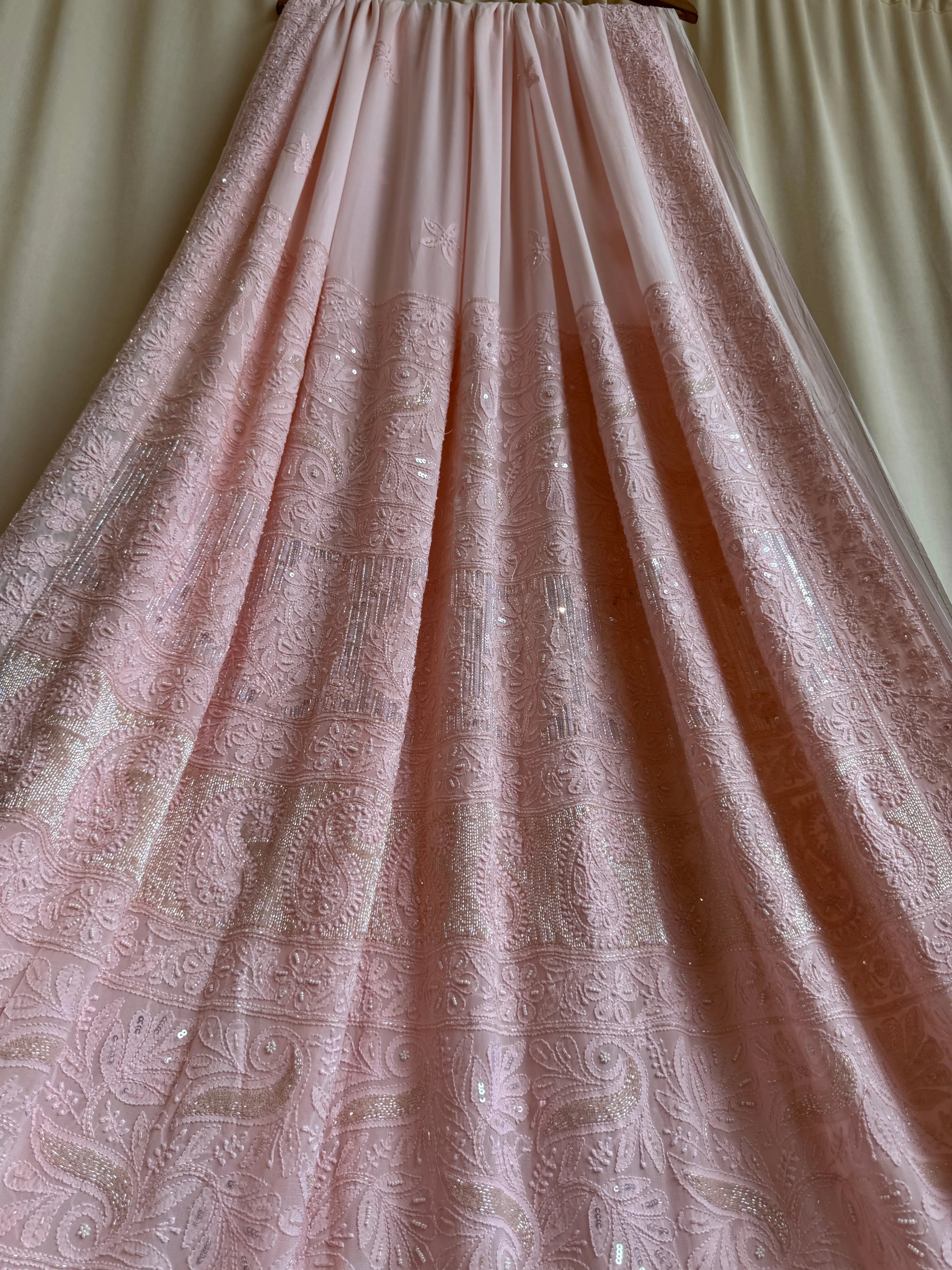 Viscose Peach Chikankari saree with Pearl embellishments ARIAA CHIKANKARI