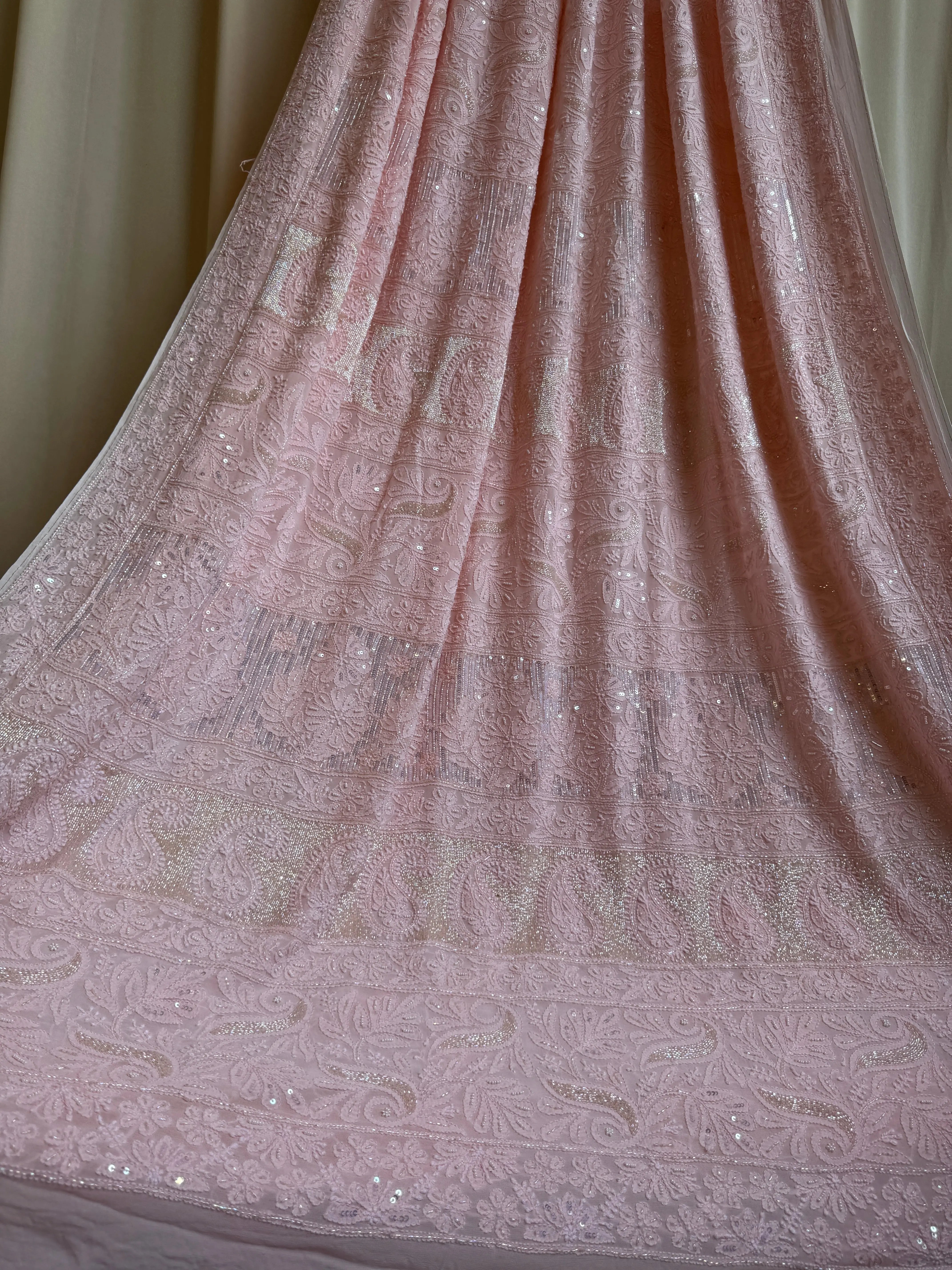 Viscose Peach Chikankari saree with Pearl embellishments ARIAA CHIKANKARI