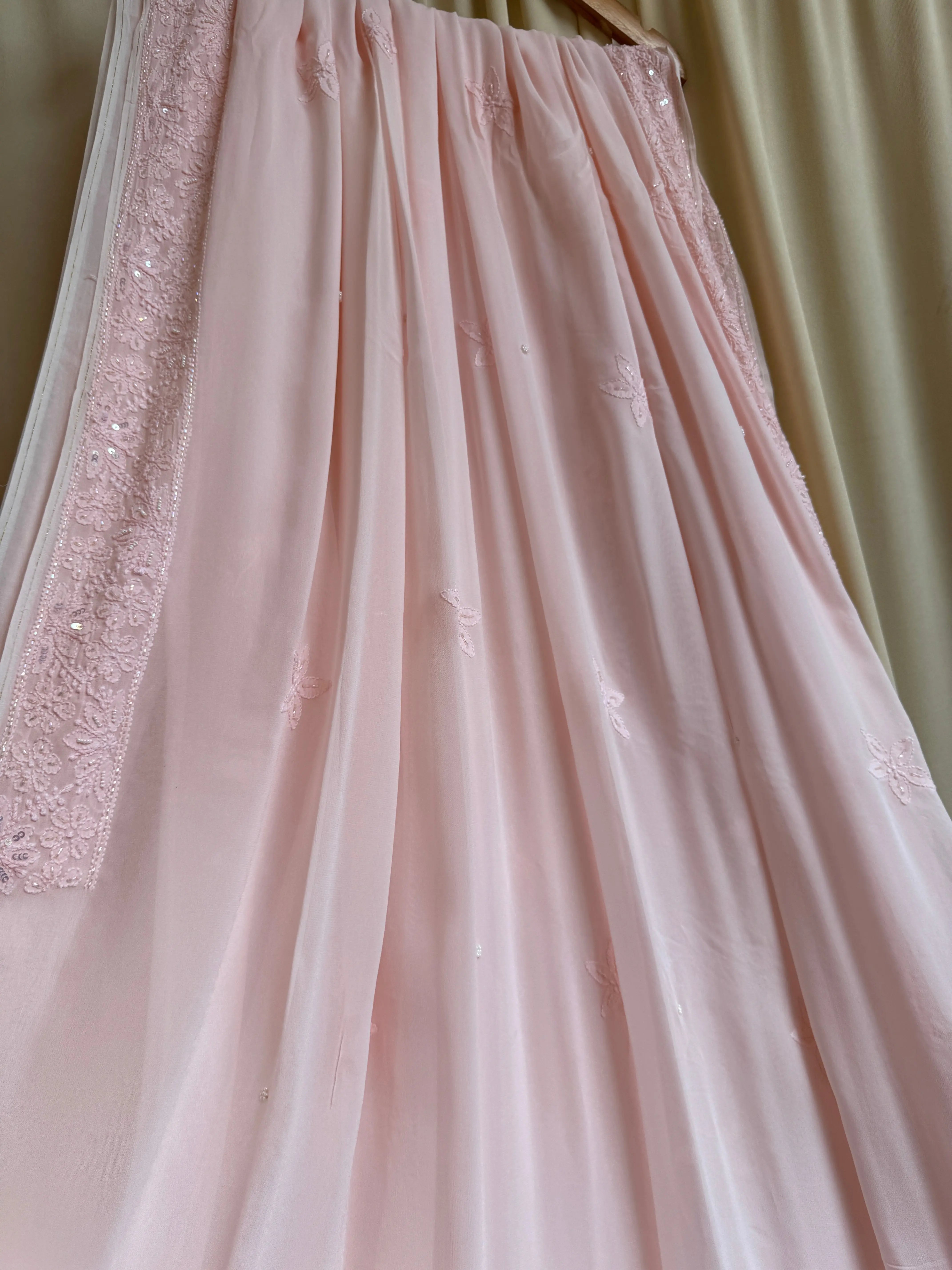 Viscose Peach Chikankari saree with Pearl embellishments ARIAA CHIKANKARI