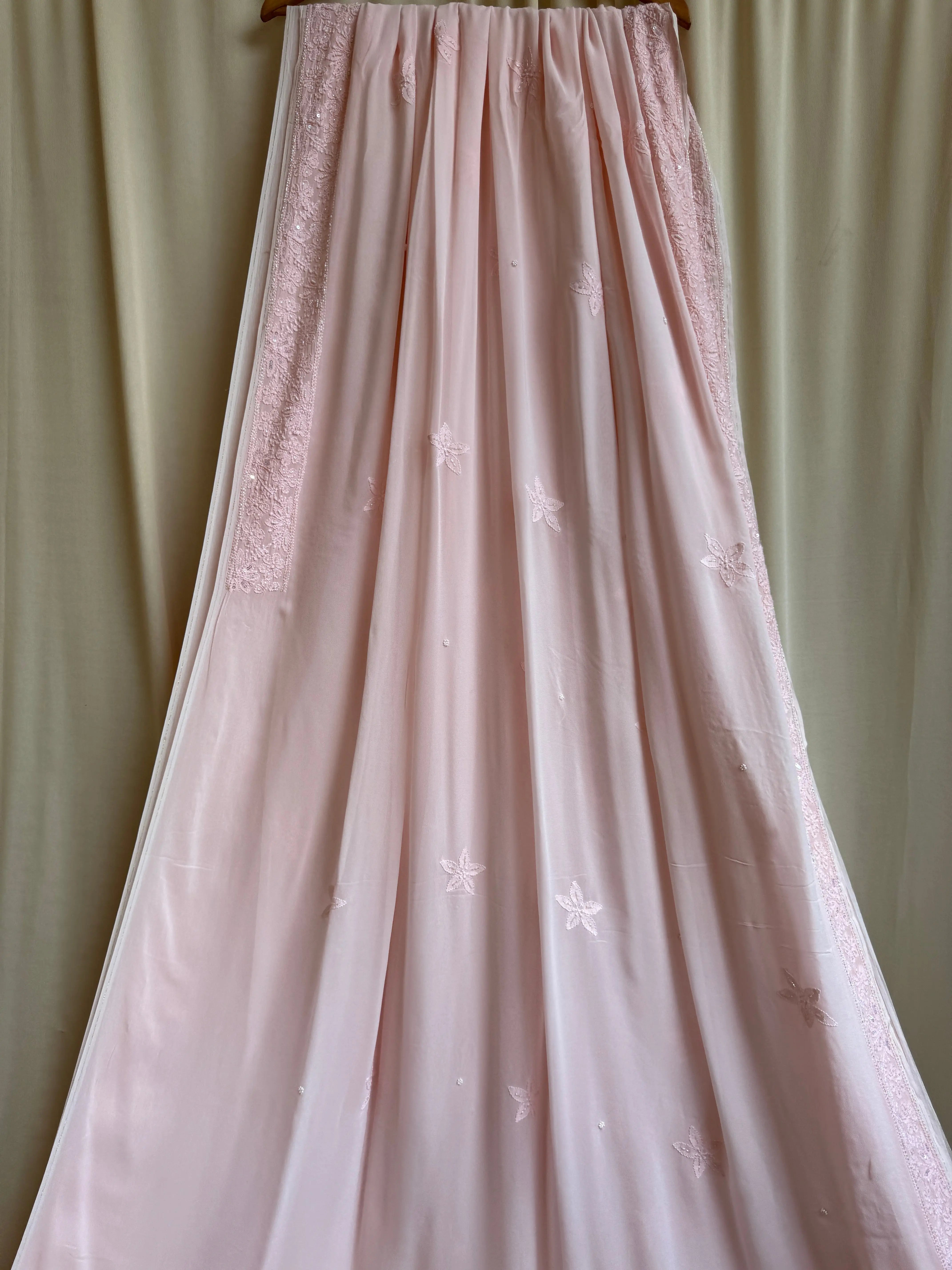 Viscose Peach Chikankari saree with Pearl embellishments ARIAA CHIKANKARI