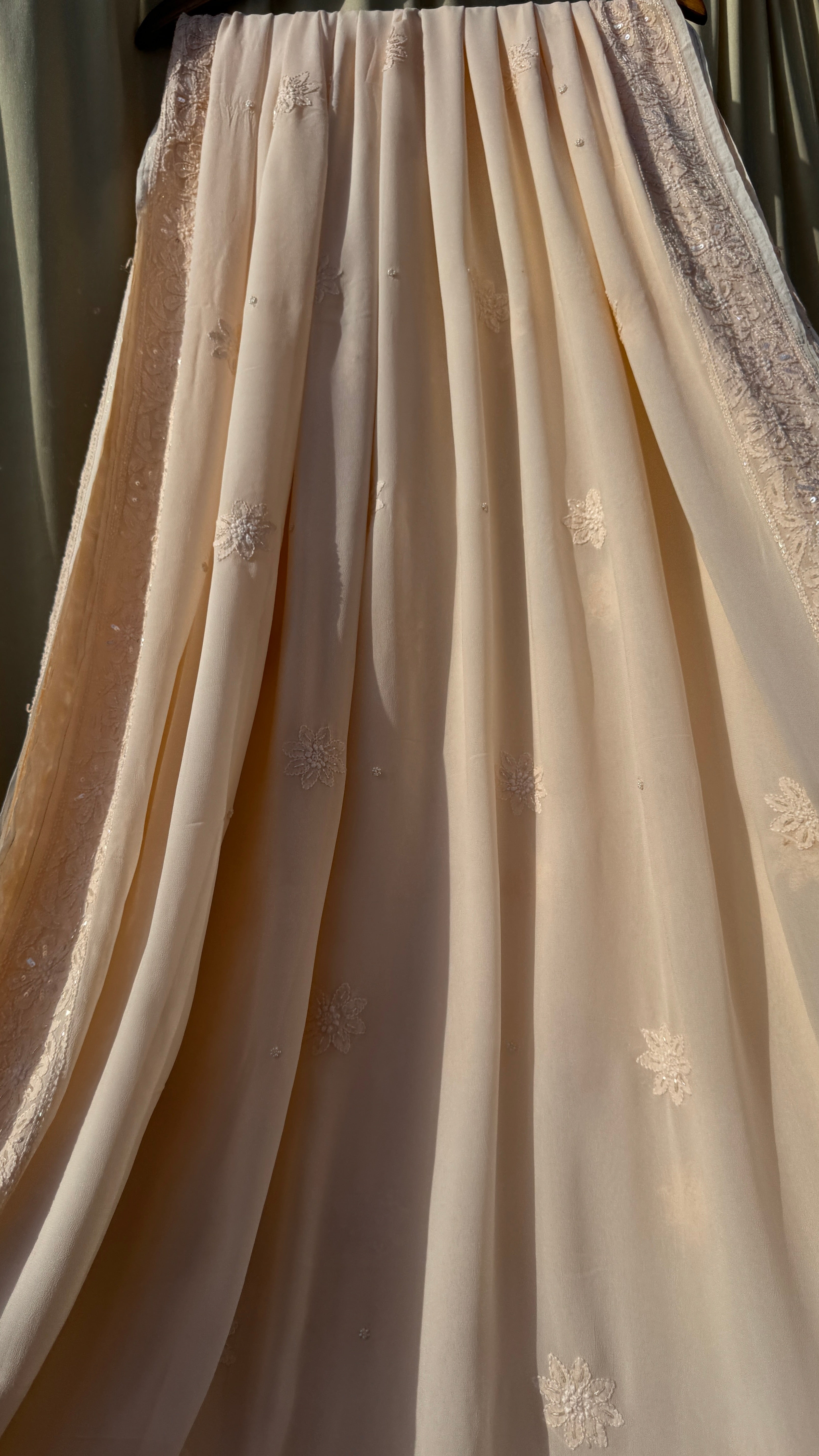Viscose Peach Chikankari saree with Pearl embellishments