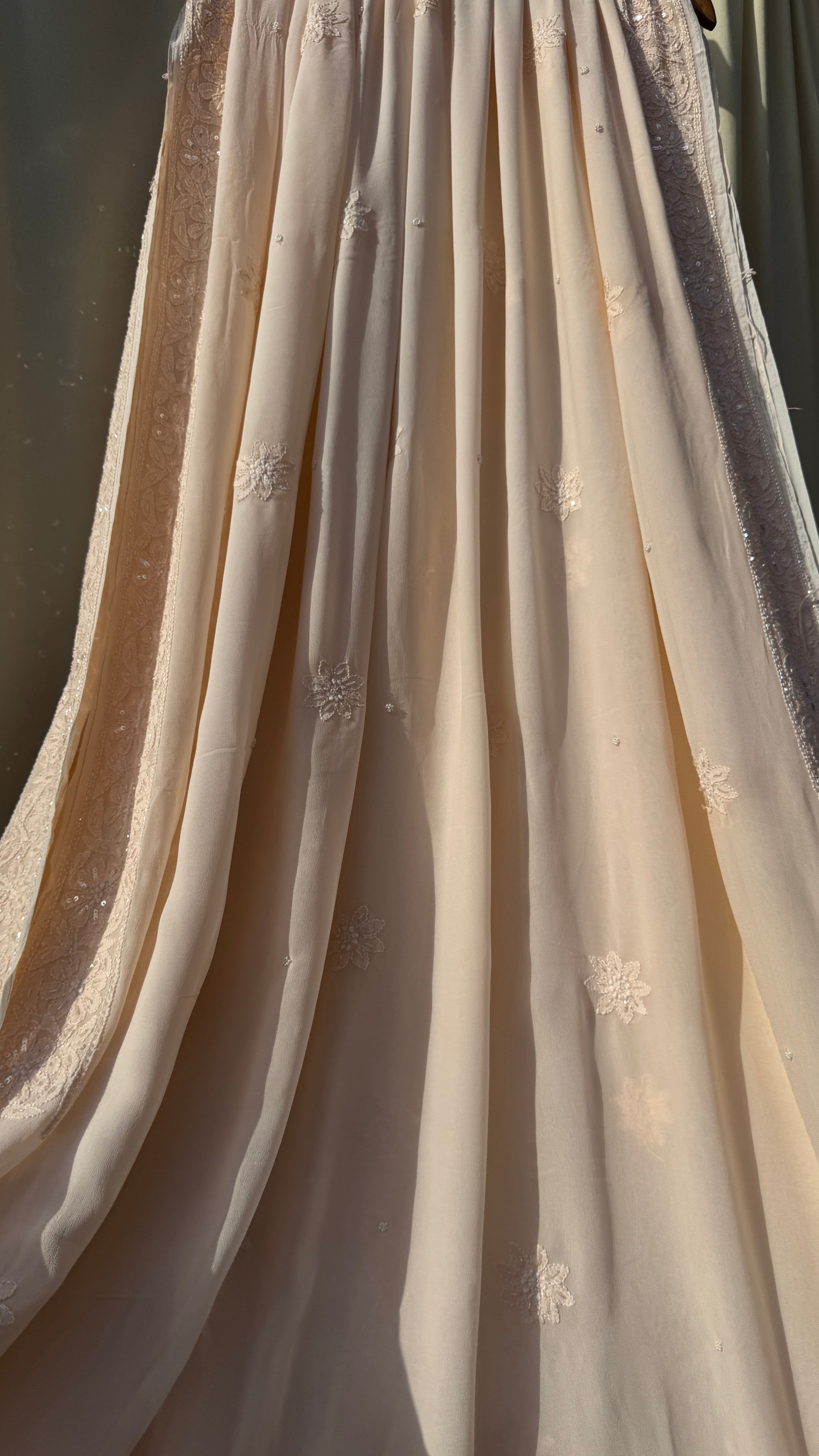 Viscose Peach Chikankari saree with Pearl embellishments