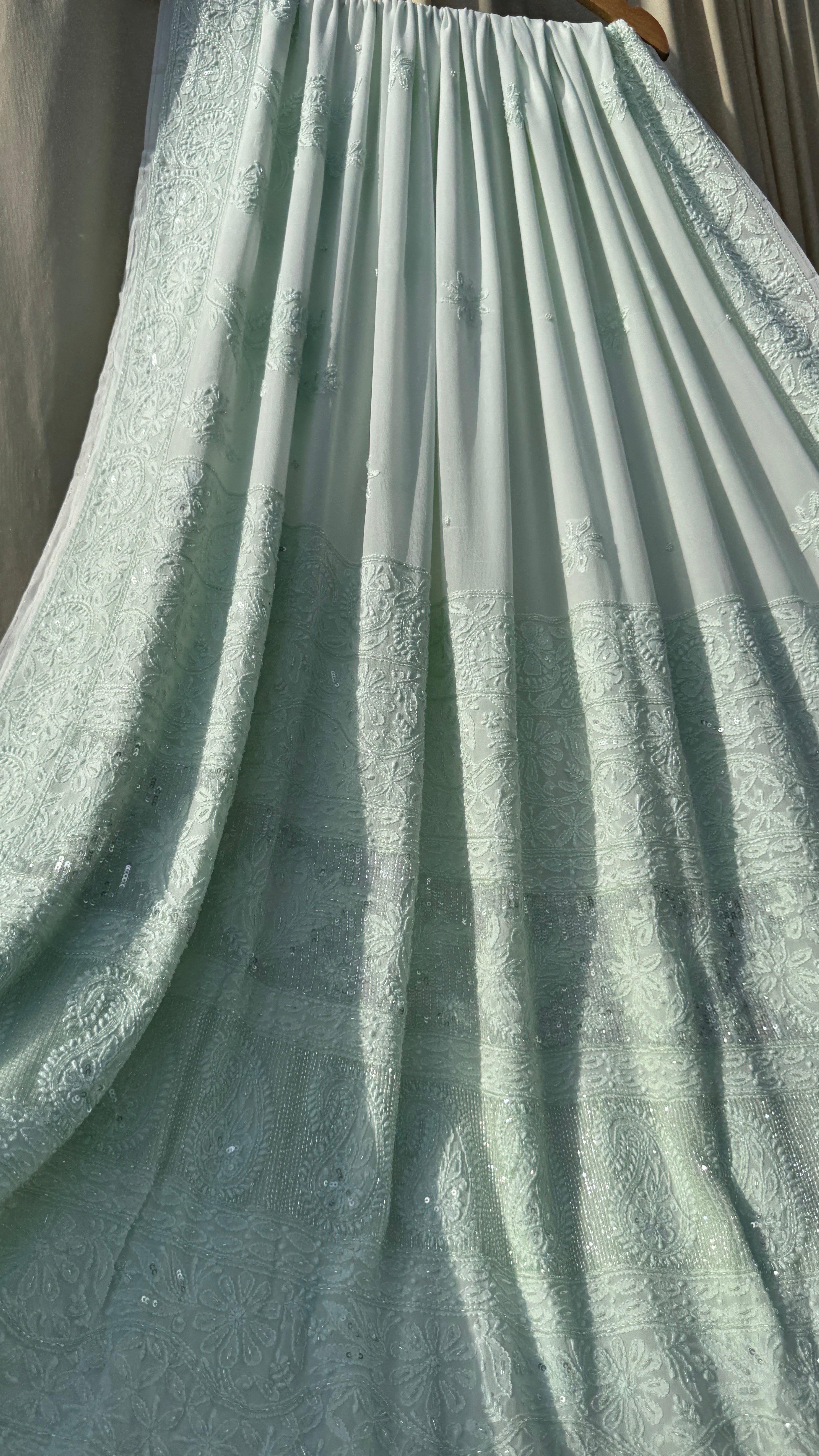 Pastel Green Chikankari saree with Pearl embellishments