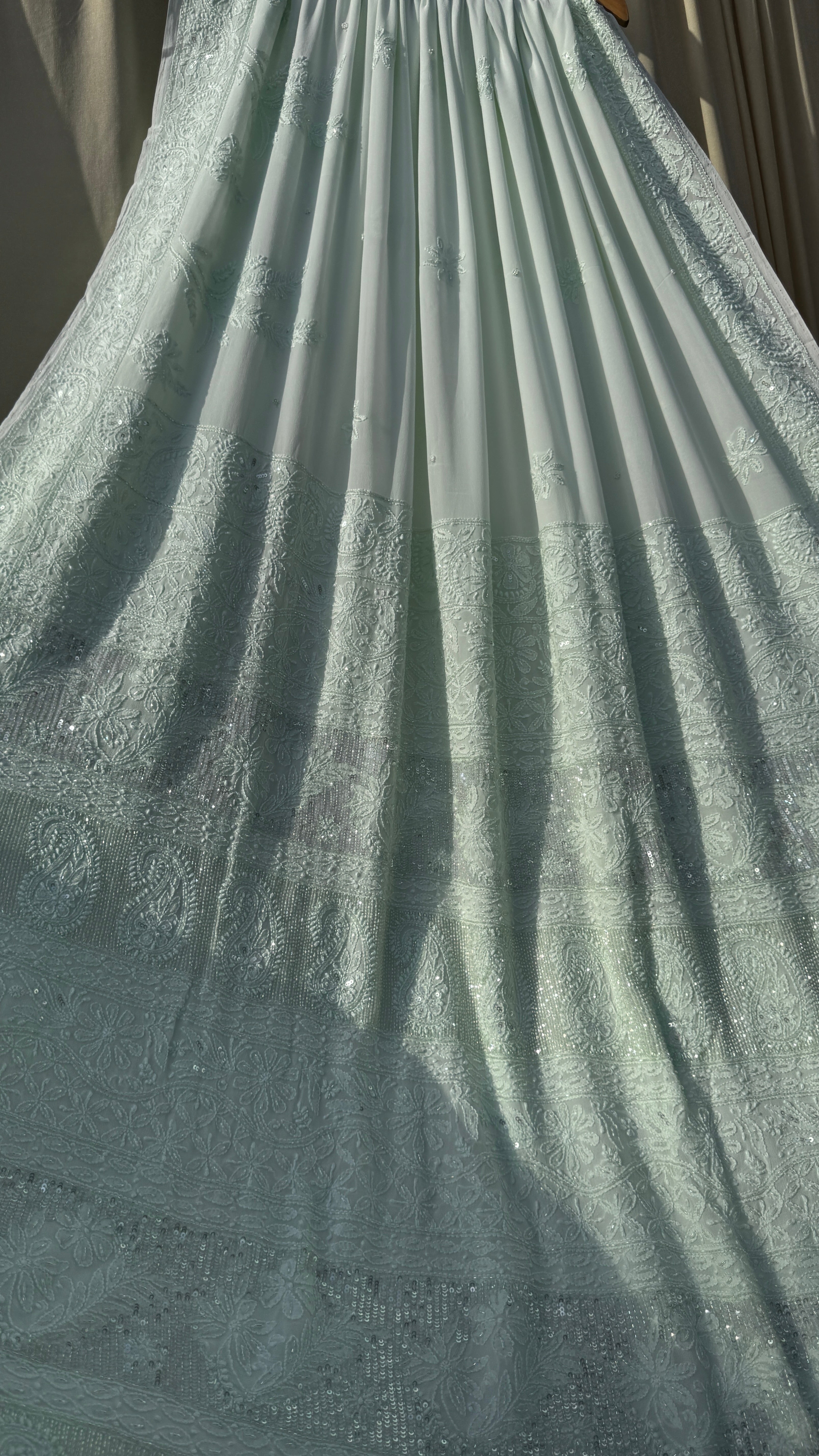Pastel Green Chikankari saree with Pearl embellishments