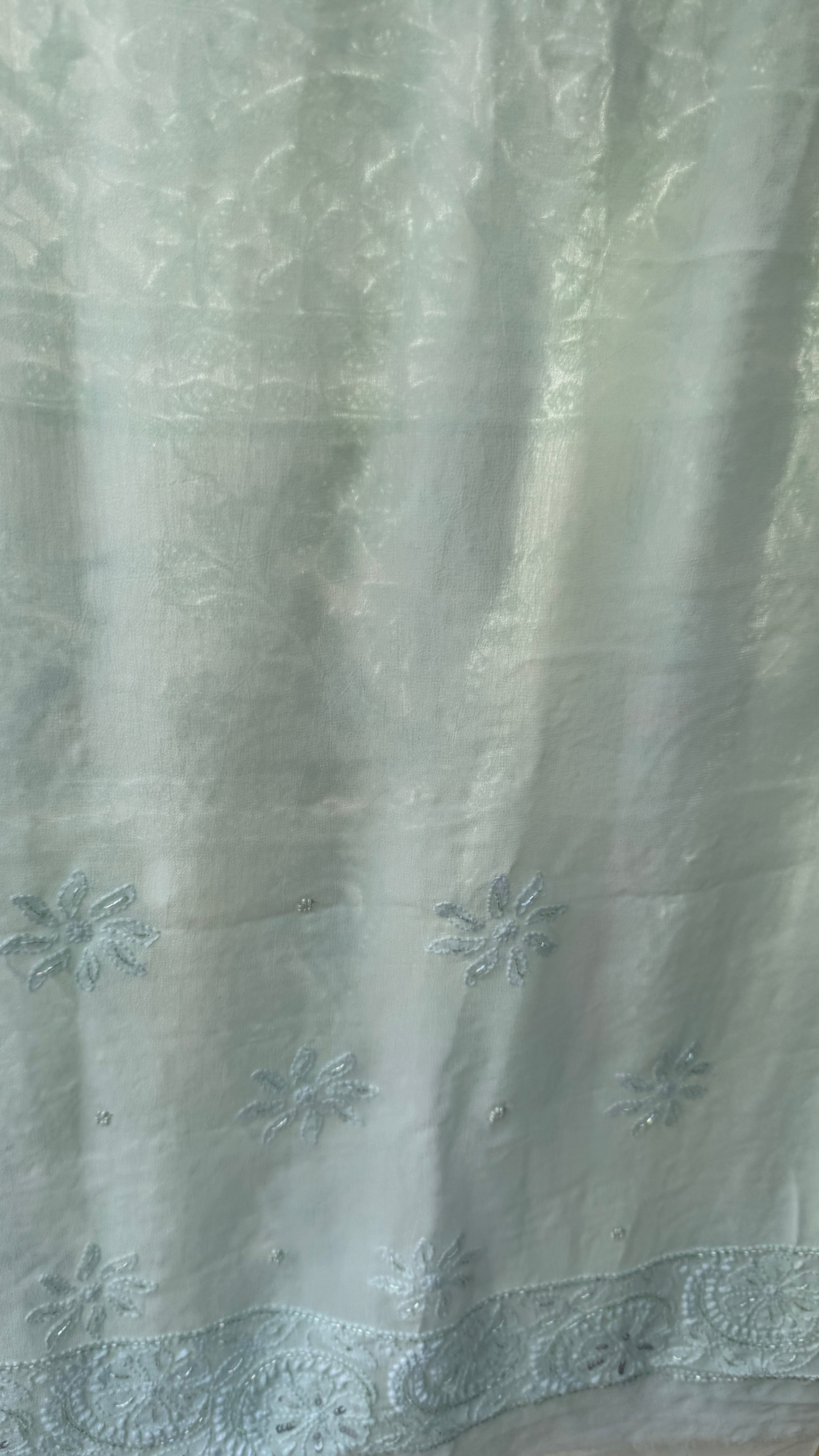 Pastel Green Chikankari saree with Pearl embellishments