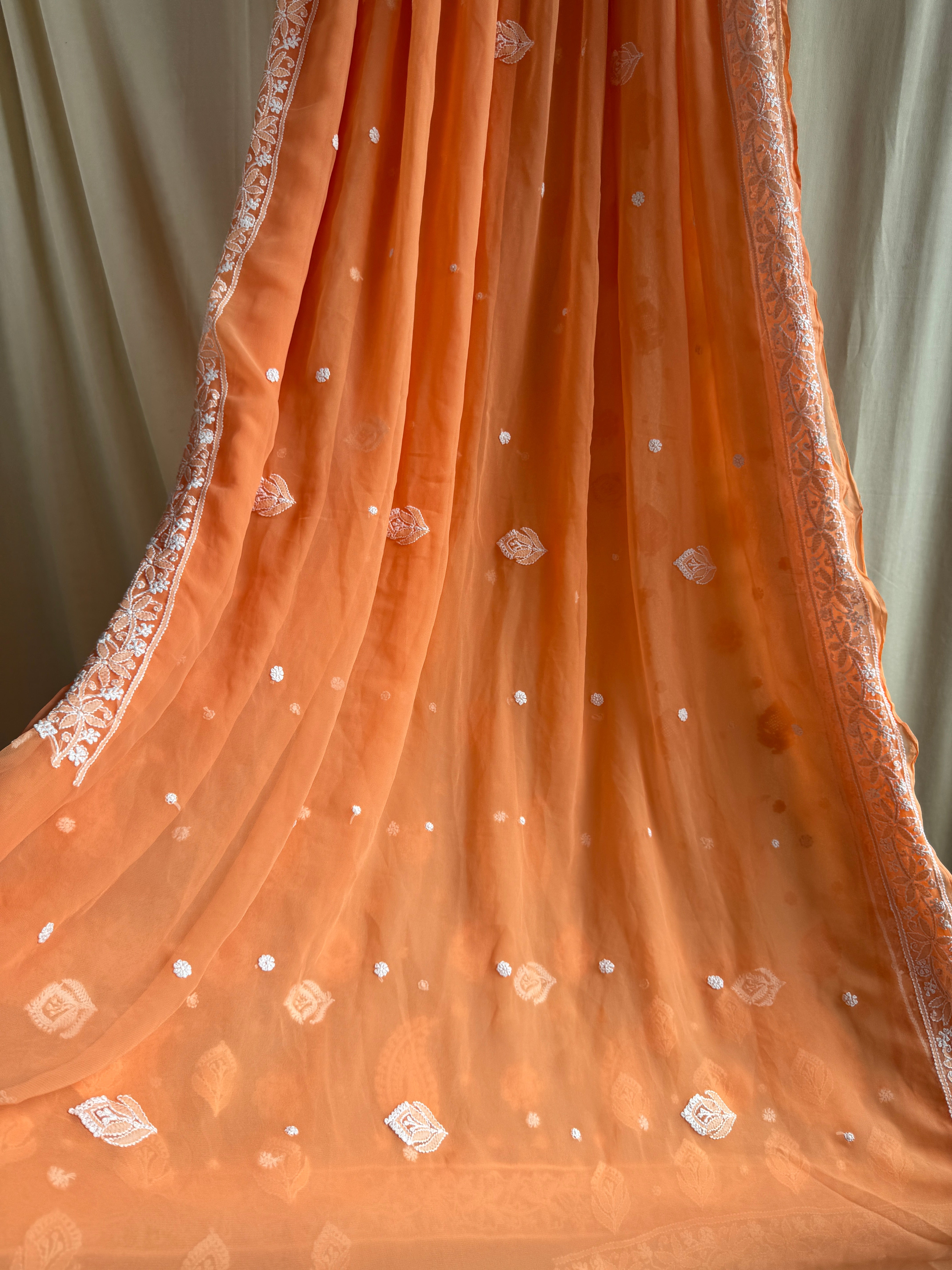 Georgette Chikankari saree in Sunset Orange ARIAA CHIKANKARI