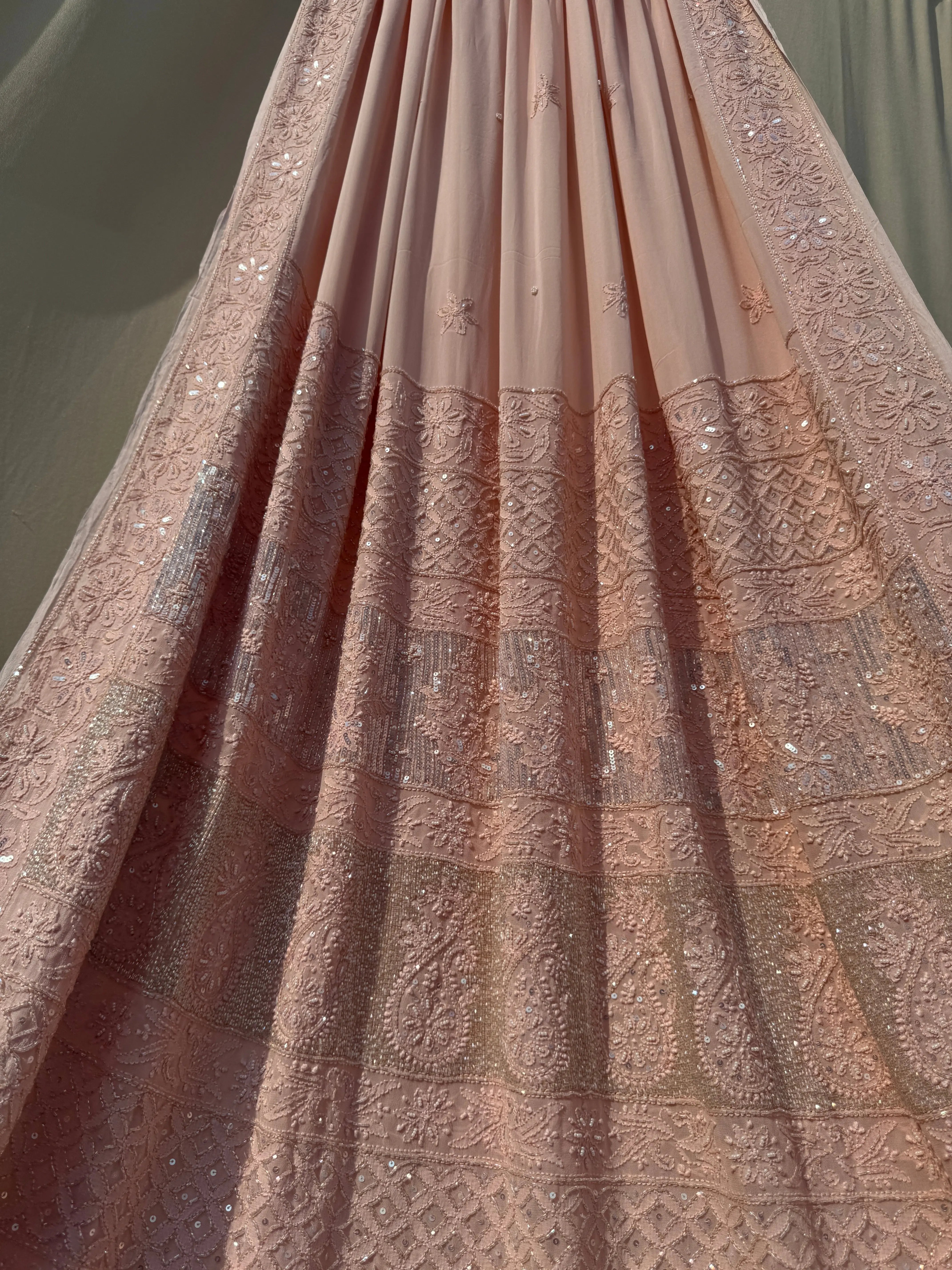 Viscose Peach Chikankari saree with Pearl embellishments ARIAA CHIKANKARI