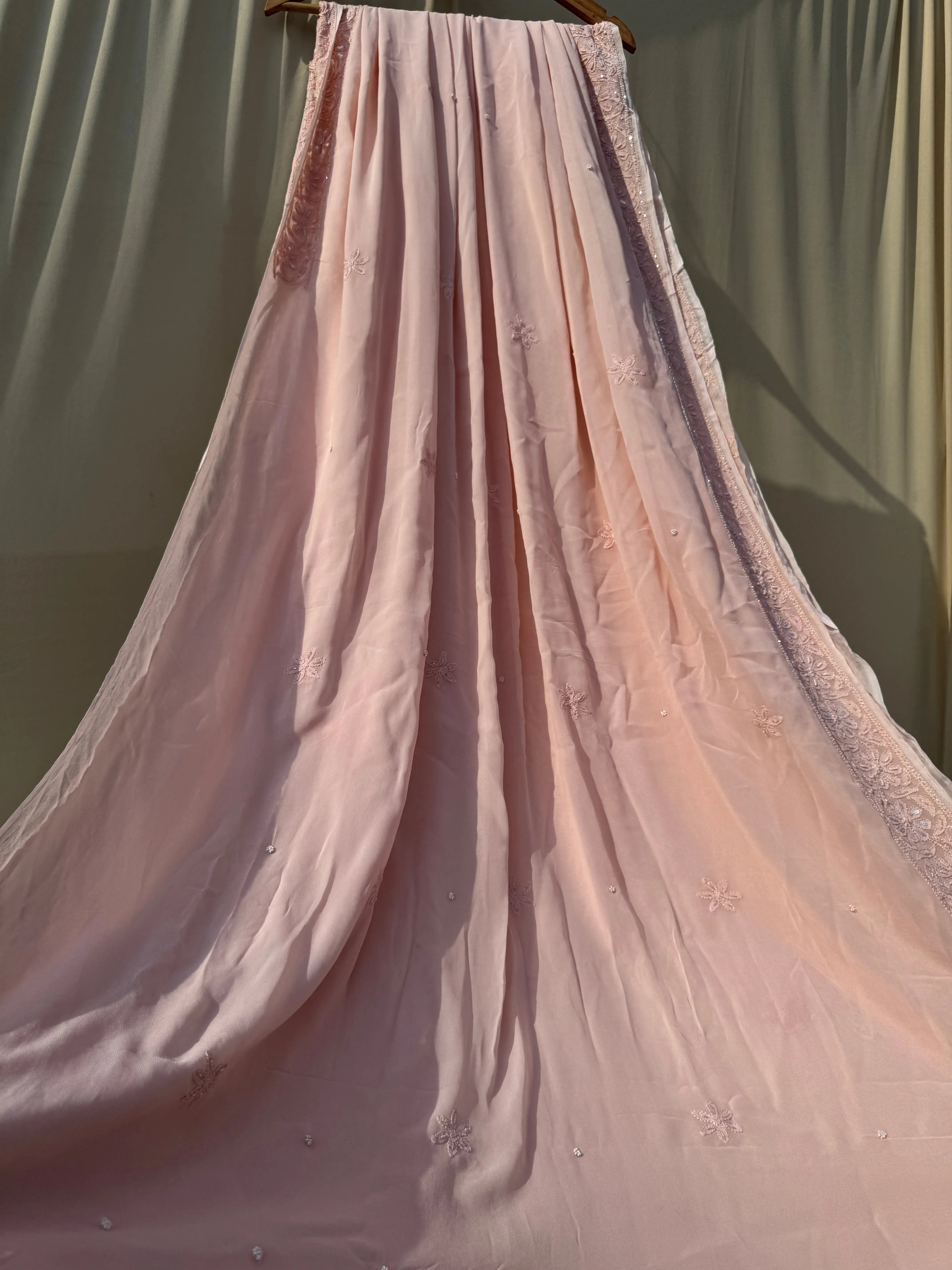 Viscose Peach Chikankari saree with Pearl embellishments ARIAA CHIKANKARI