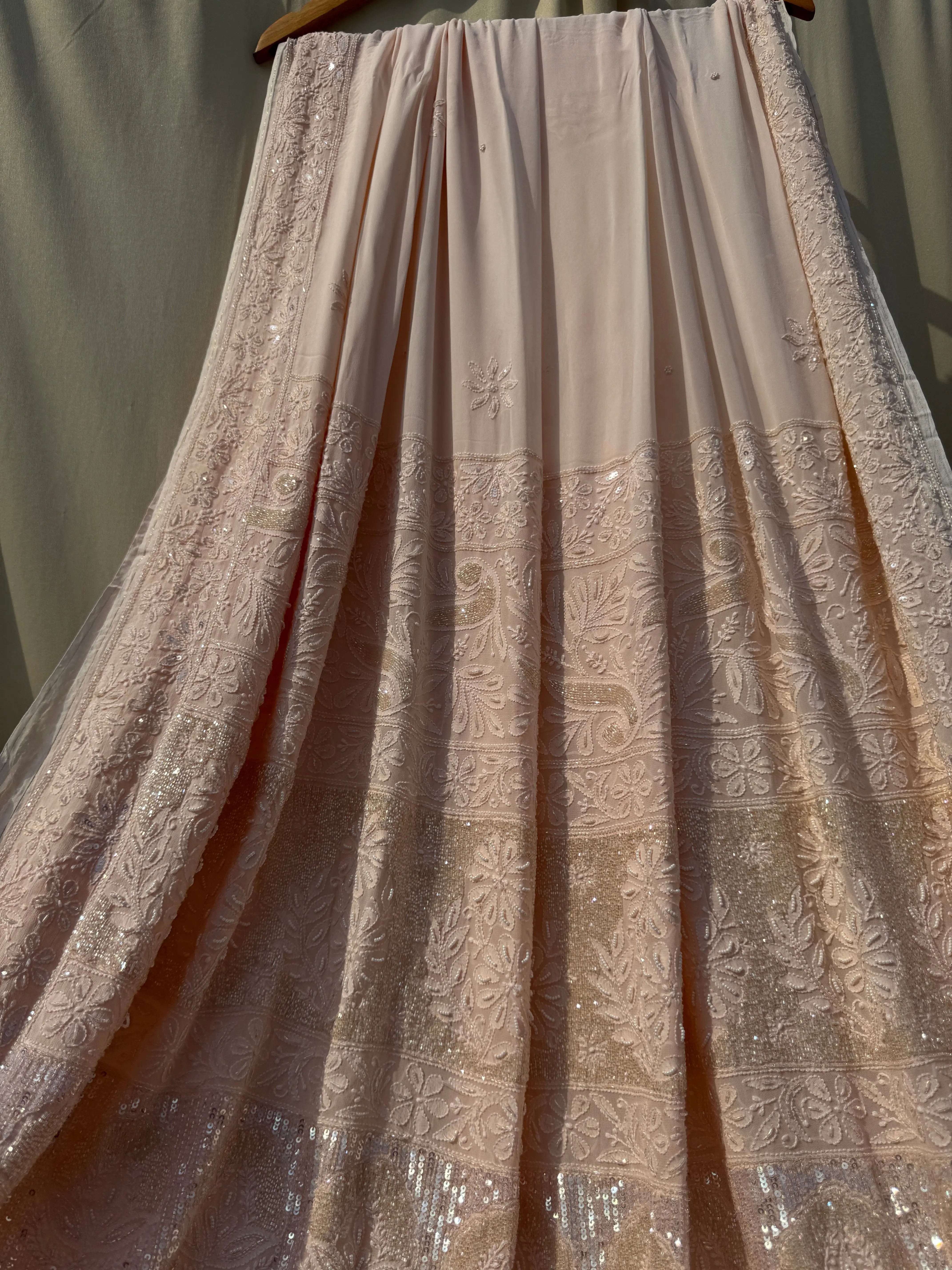 Viscose Peach Chikankari saree with Pearl embellishments ARIAA CHIKANKARI