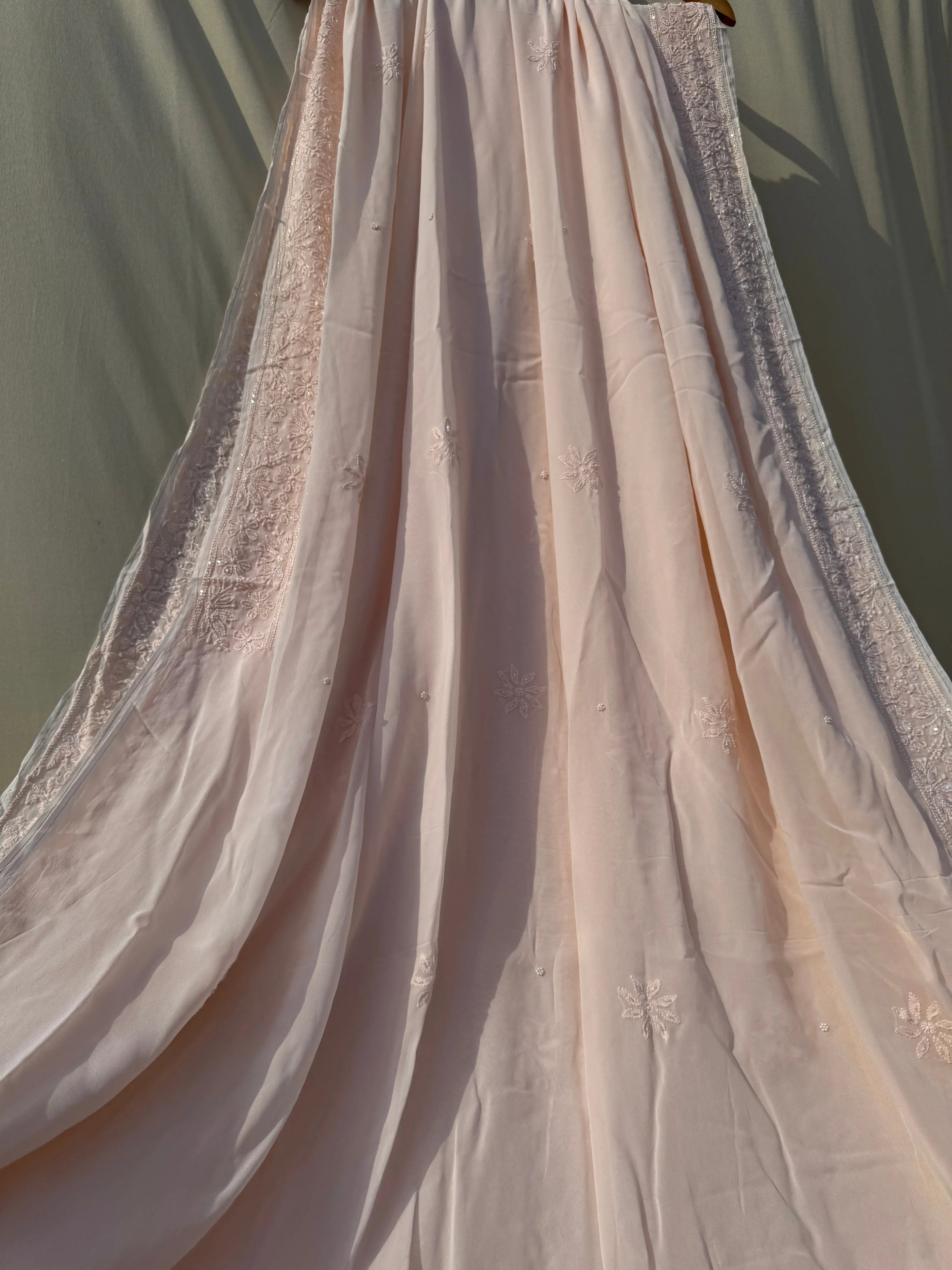 Viscose Peach Chikankari saree with Pearl embellishments ARIAA CHIKANKARI