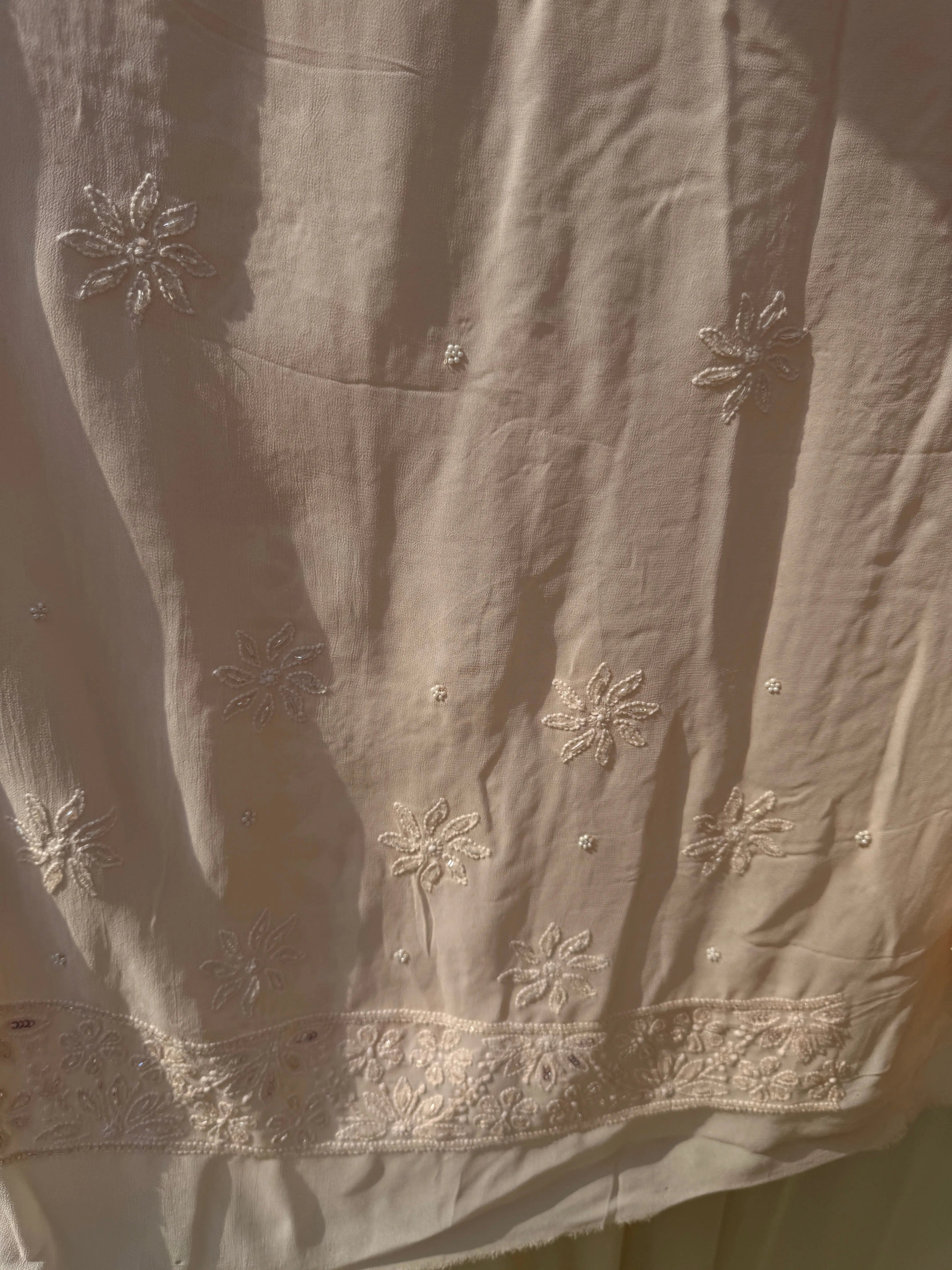 Viscose Peach Chikankari saree with Pearl embellishments ARIAA CHIKANKARI
