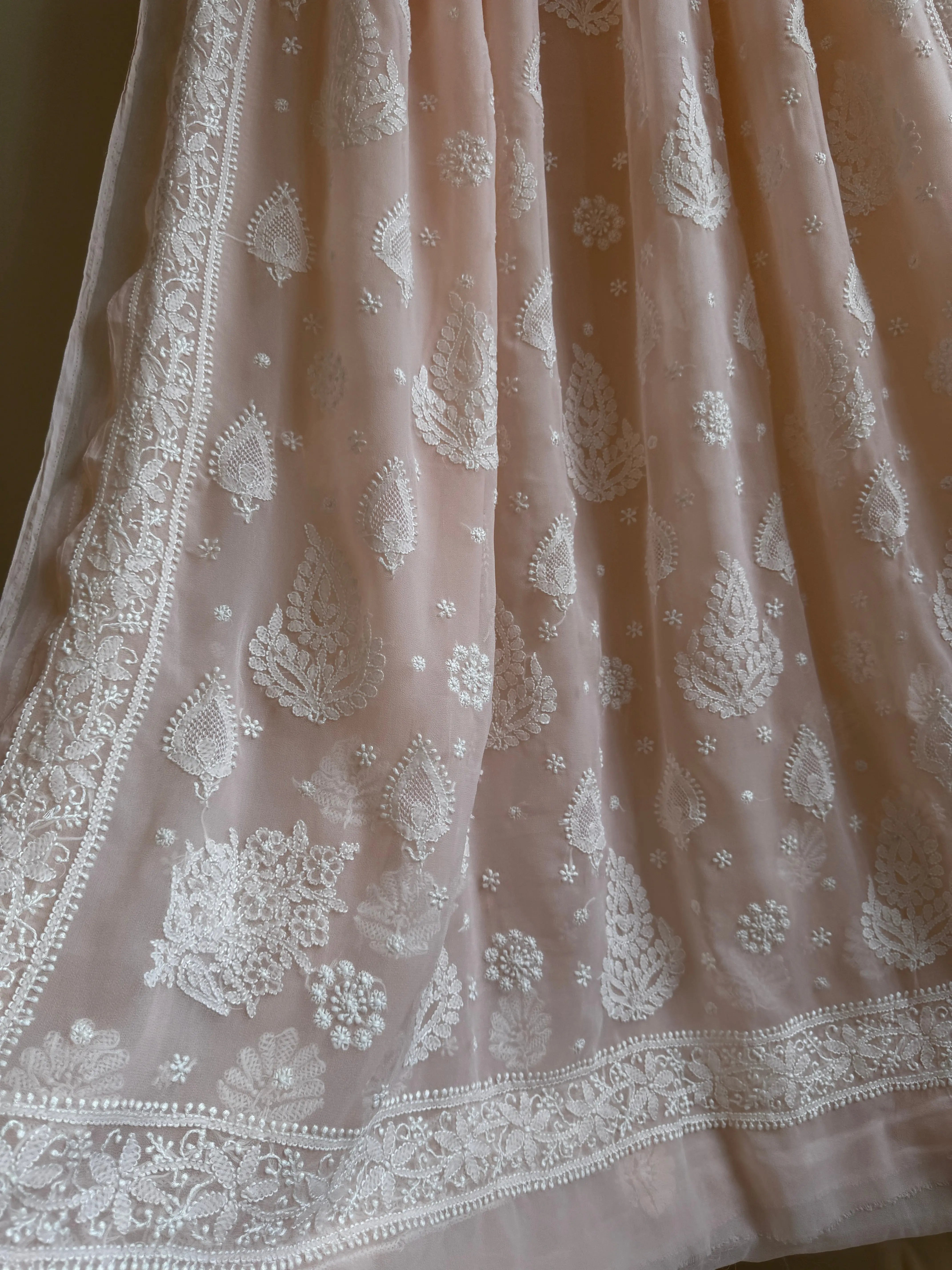 Georgette Chikankari saree in Peach ARIAA CHIKANKARI