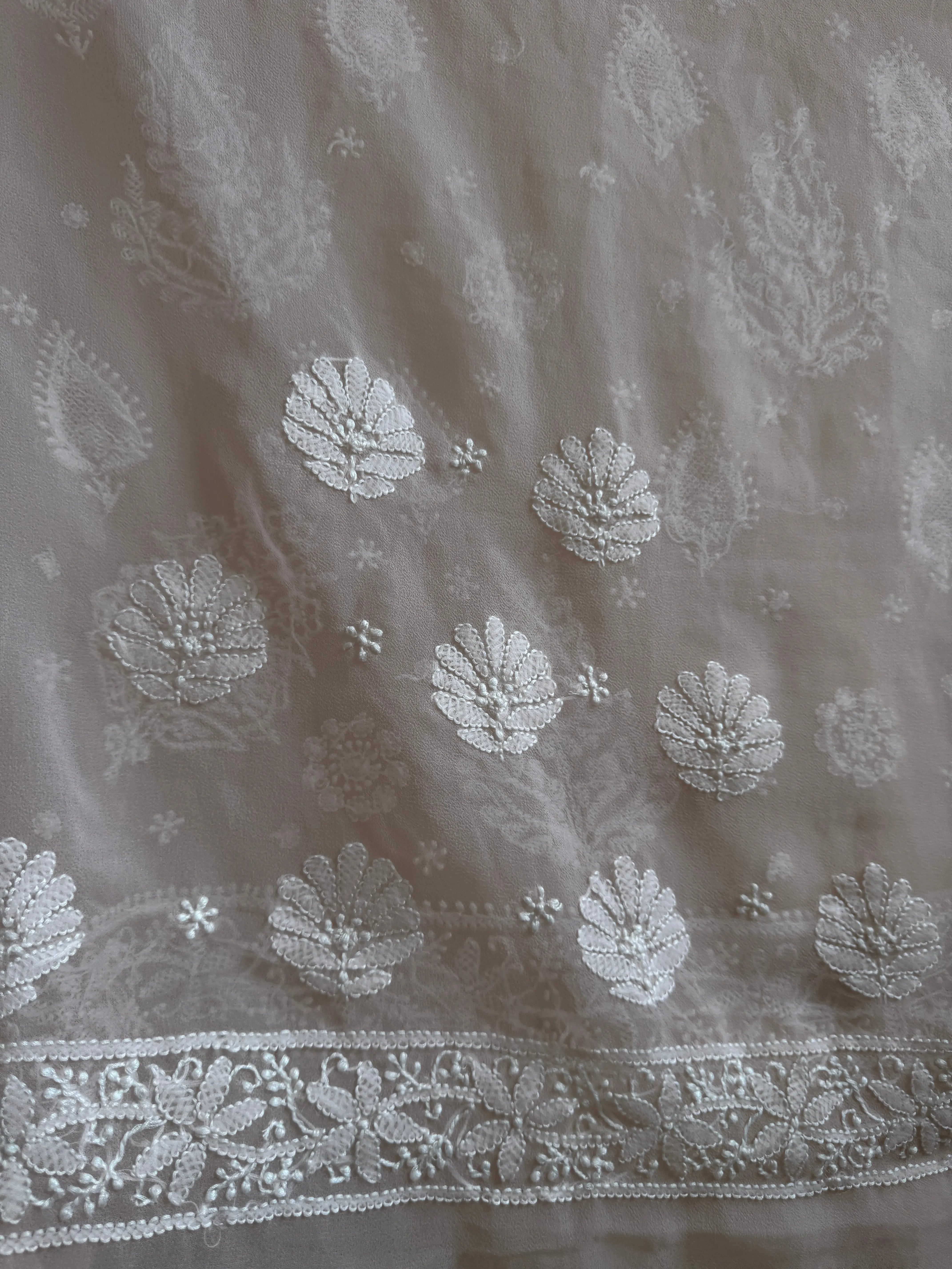 Georgette Chikankari saree in Peach ARIAA CHIKANKARI
