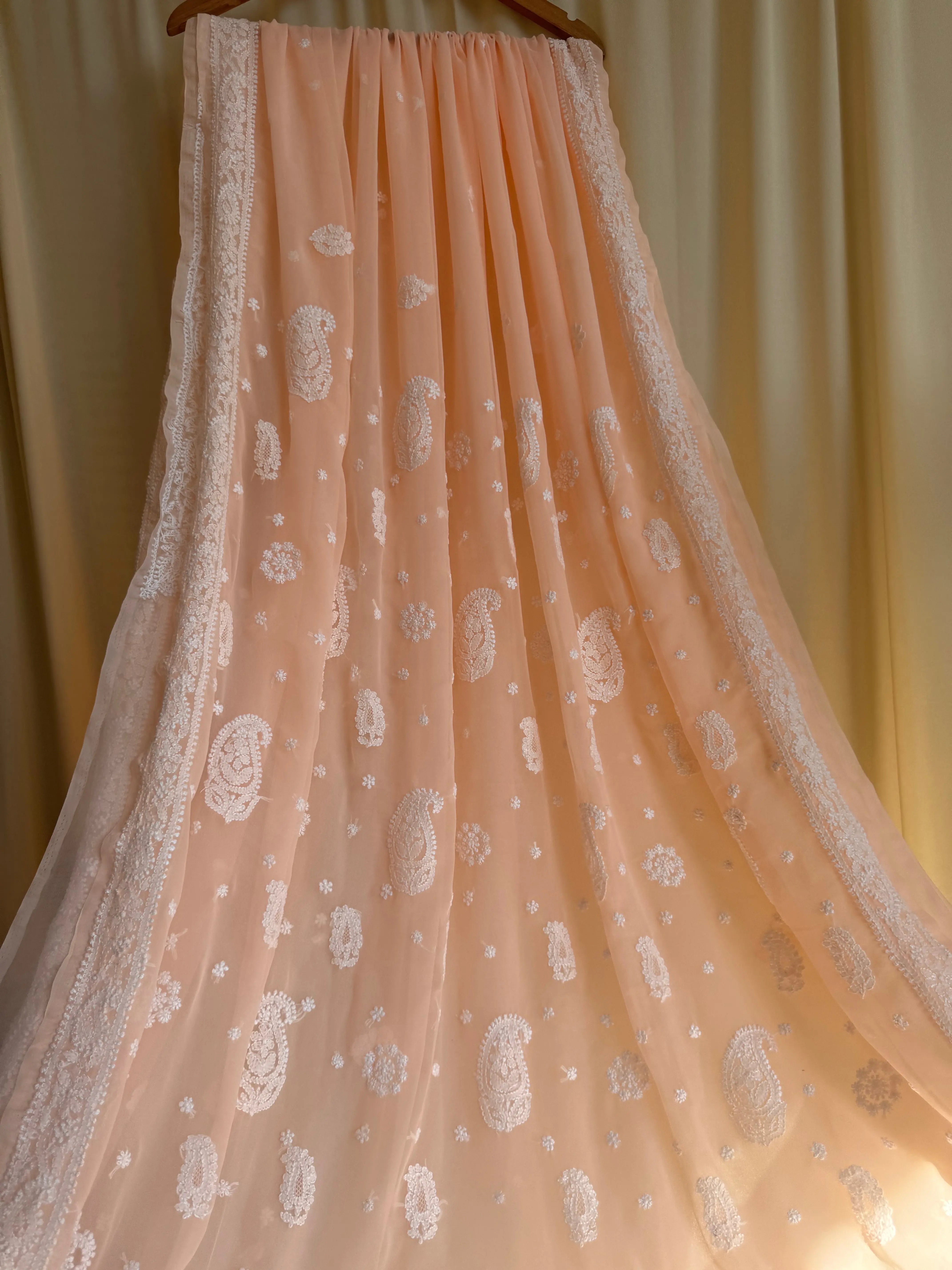 Georgette Chikankari saree in Peach ARIAA CHIKANKARI