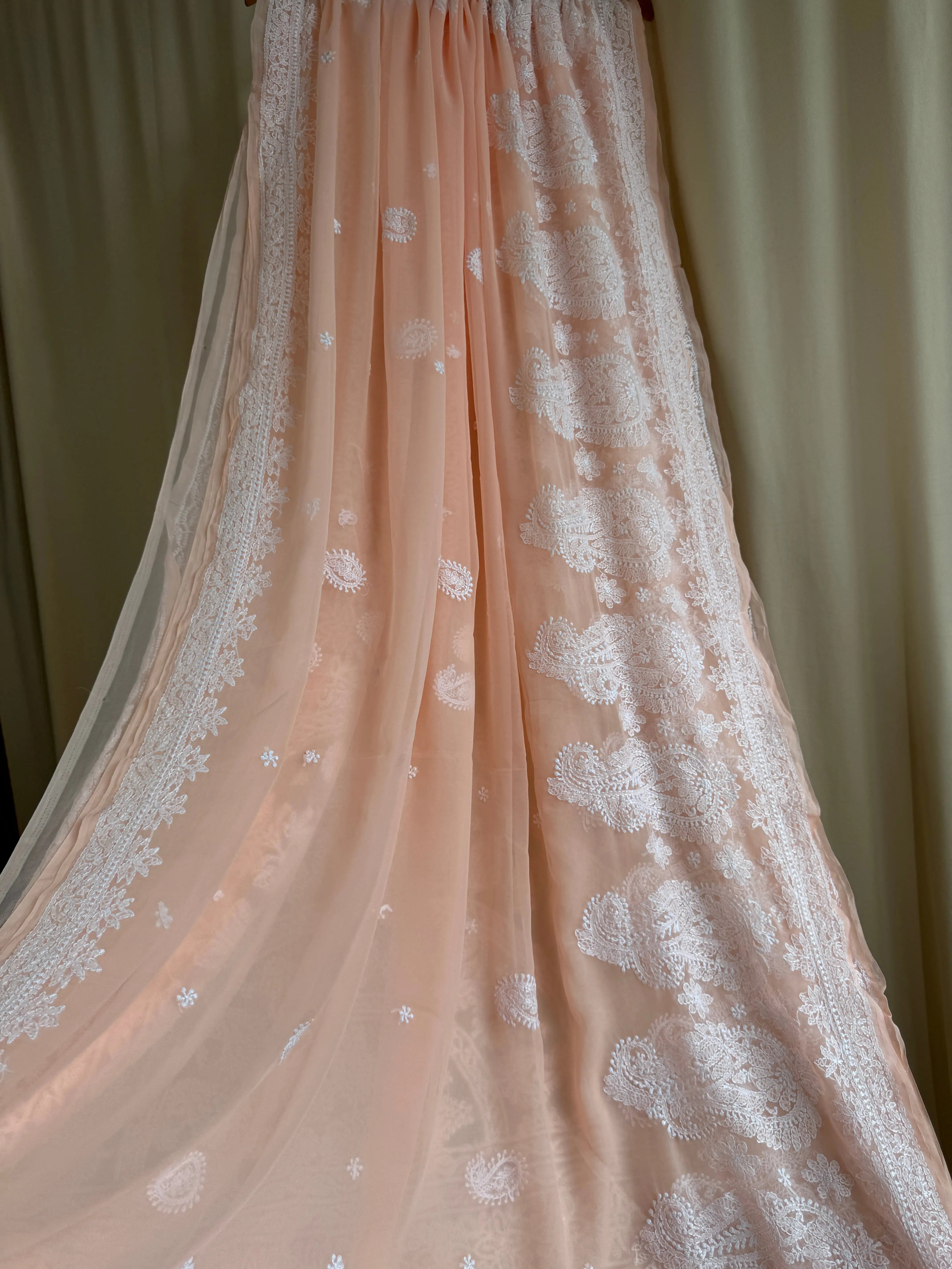 Georgette Chikankari saree in Peach ARIAA CHIKANKARI