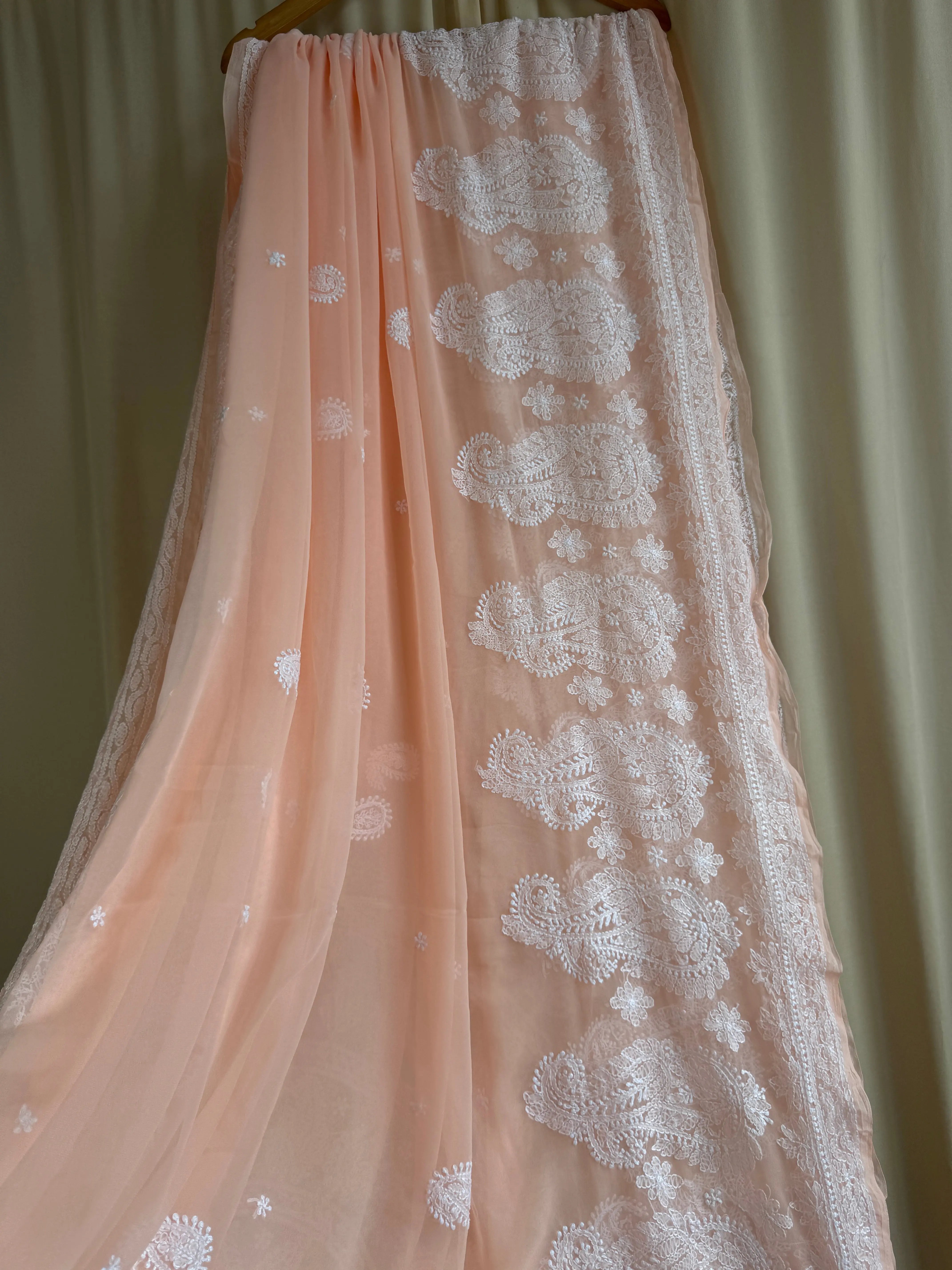 Georgette Chikankari saree in Peach ARIAA CHIKANKARI