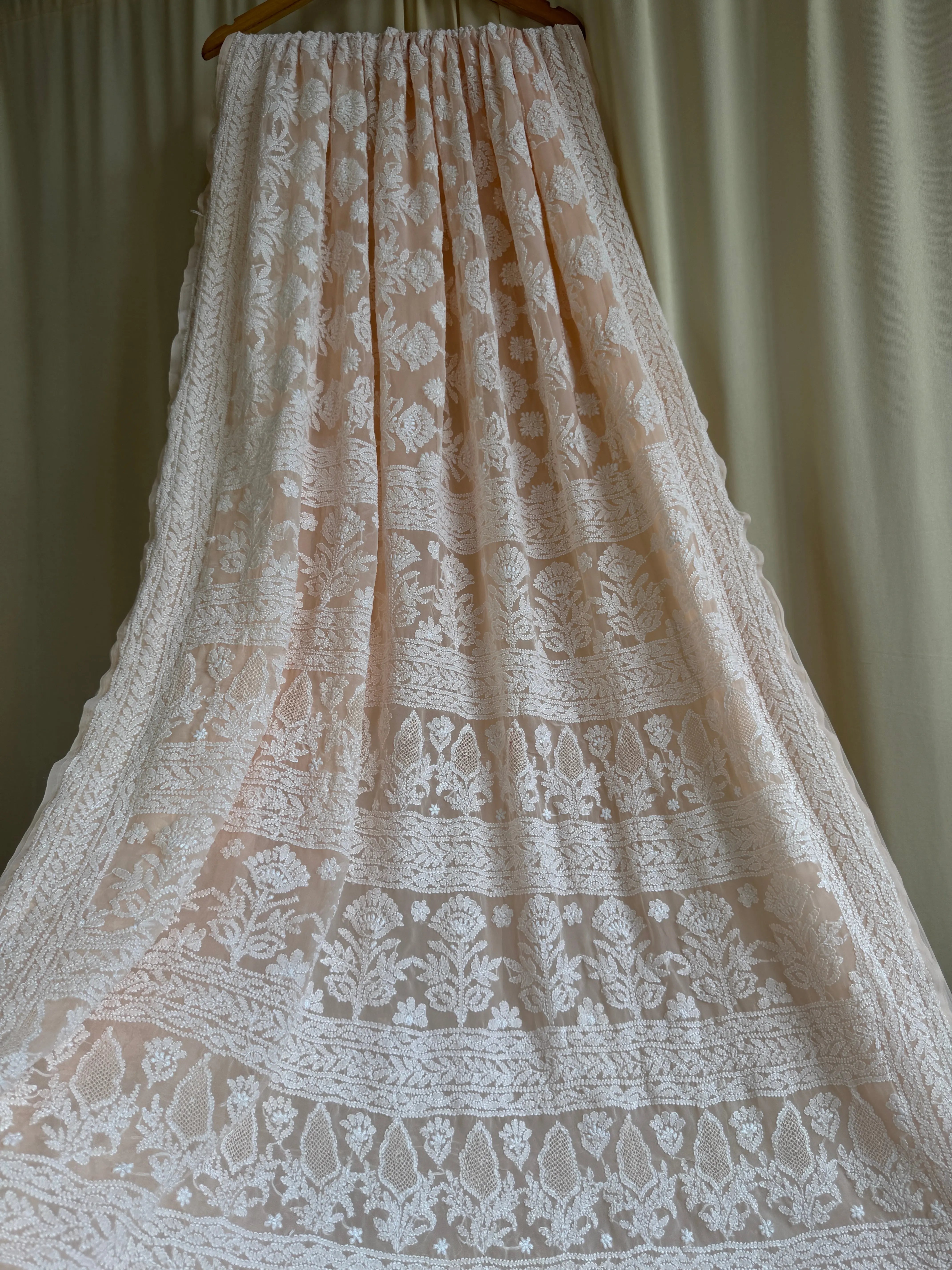 Georgette Chikankari saree in Peach ARIAA CHIKANKARI