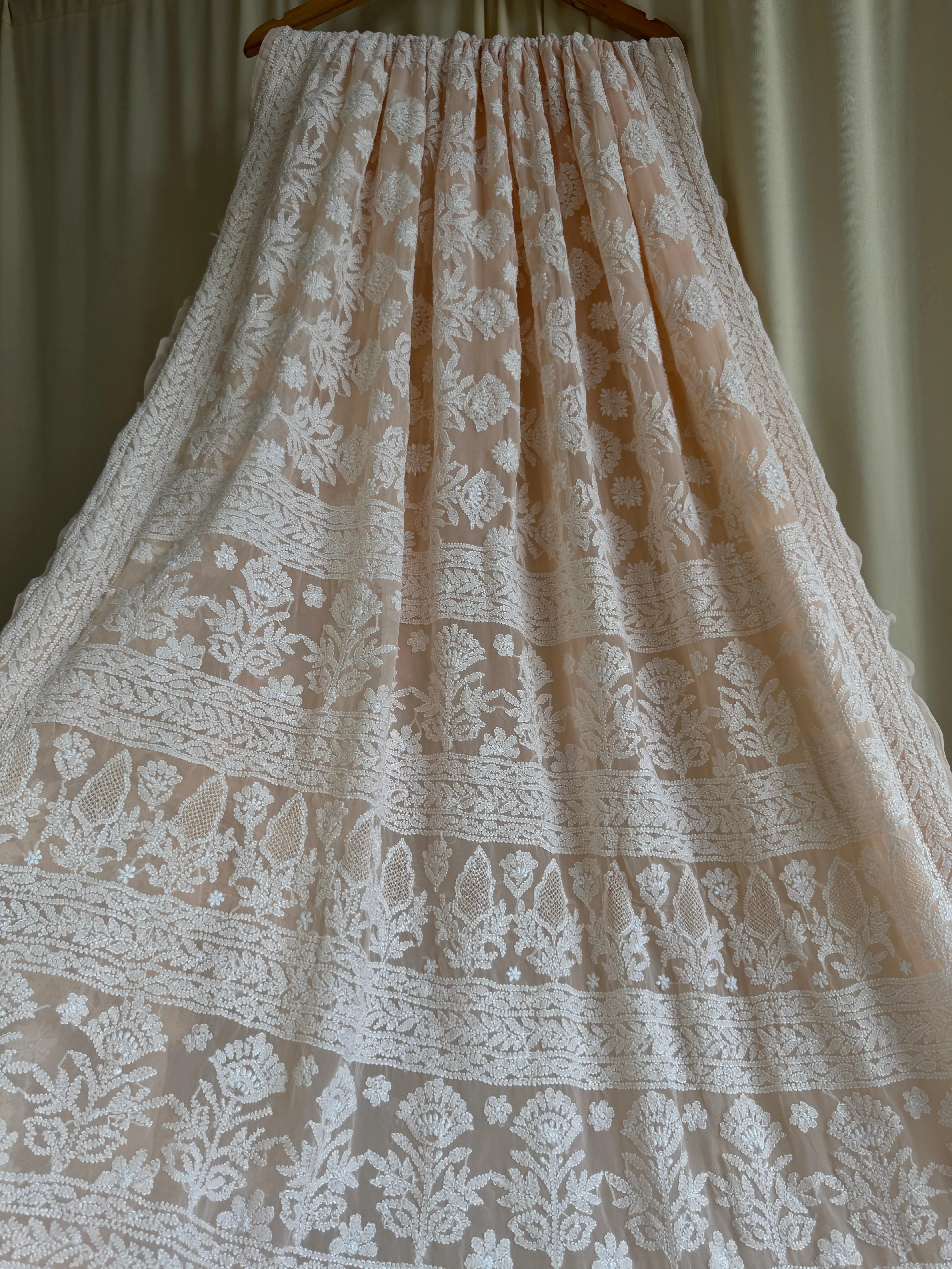 Georgette Chikankari saree in Peach ARIAA CHIKANKARI
