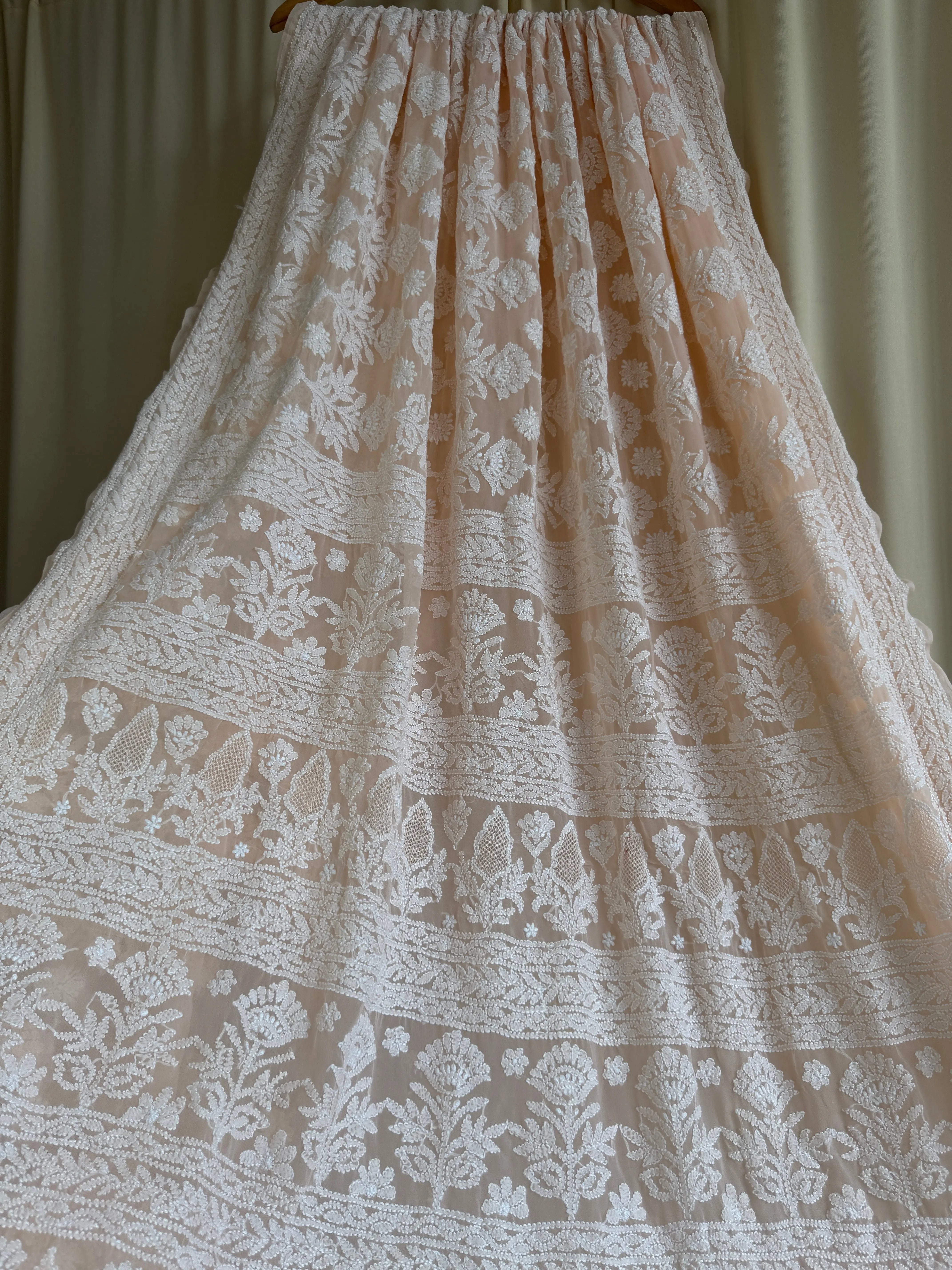 Georgette Chikankari saree in Peach ARIAA CHIKANKARI