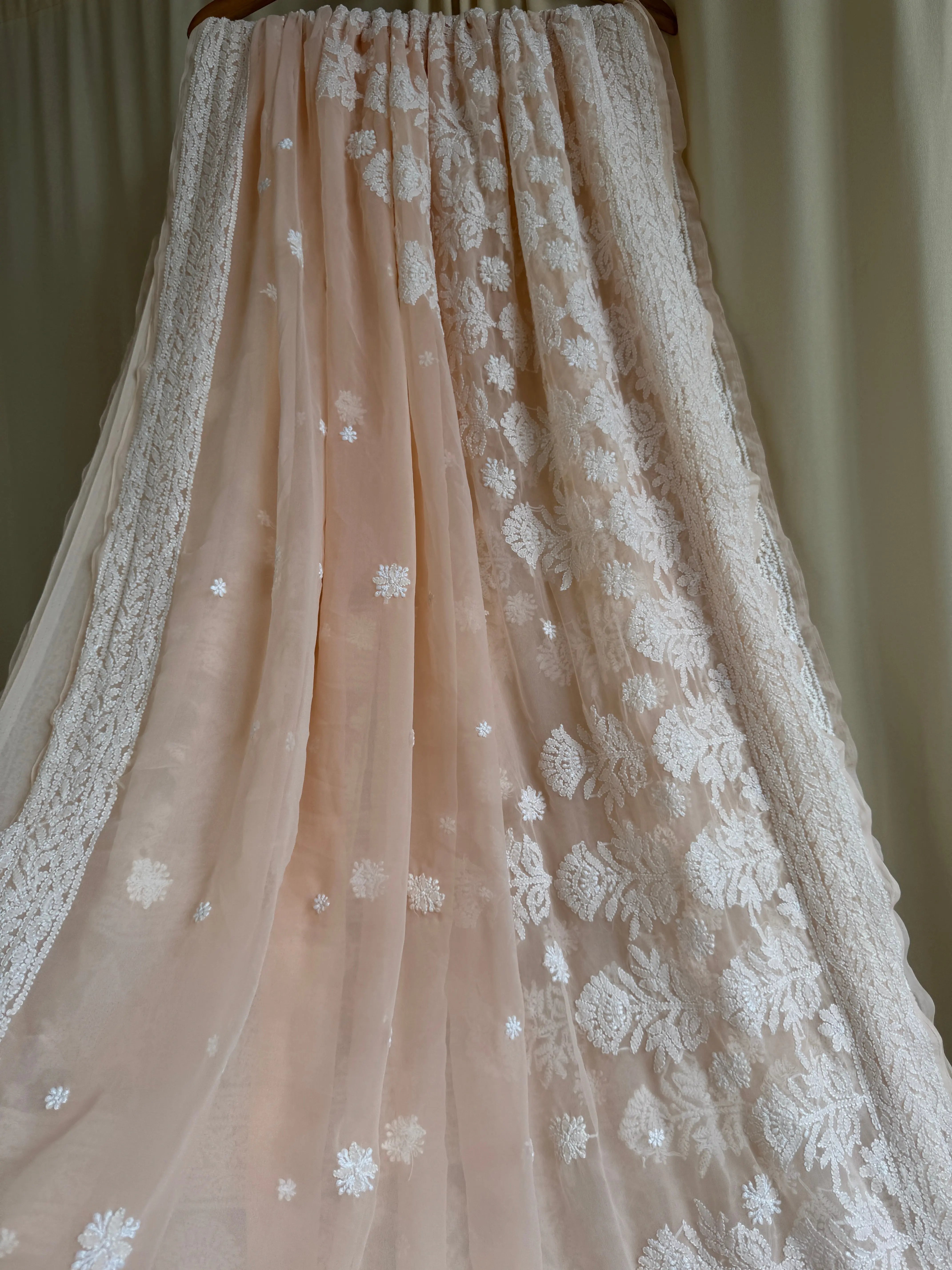 Georgette Chikankari saree in Peach ARIAA CHIKANKARI
