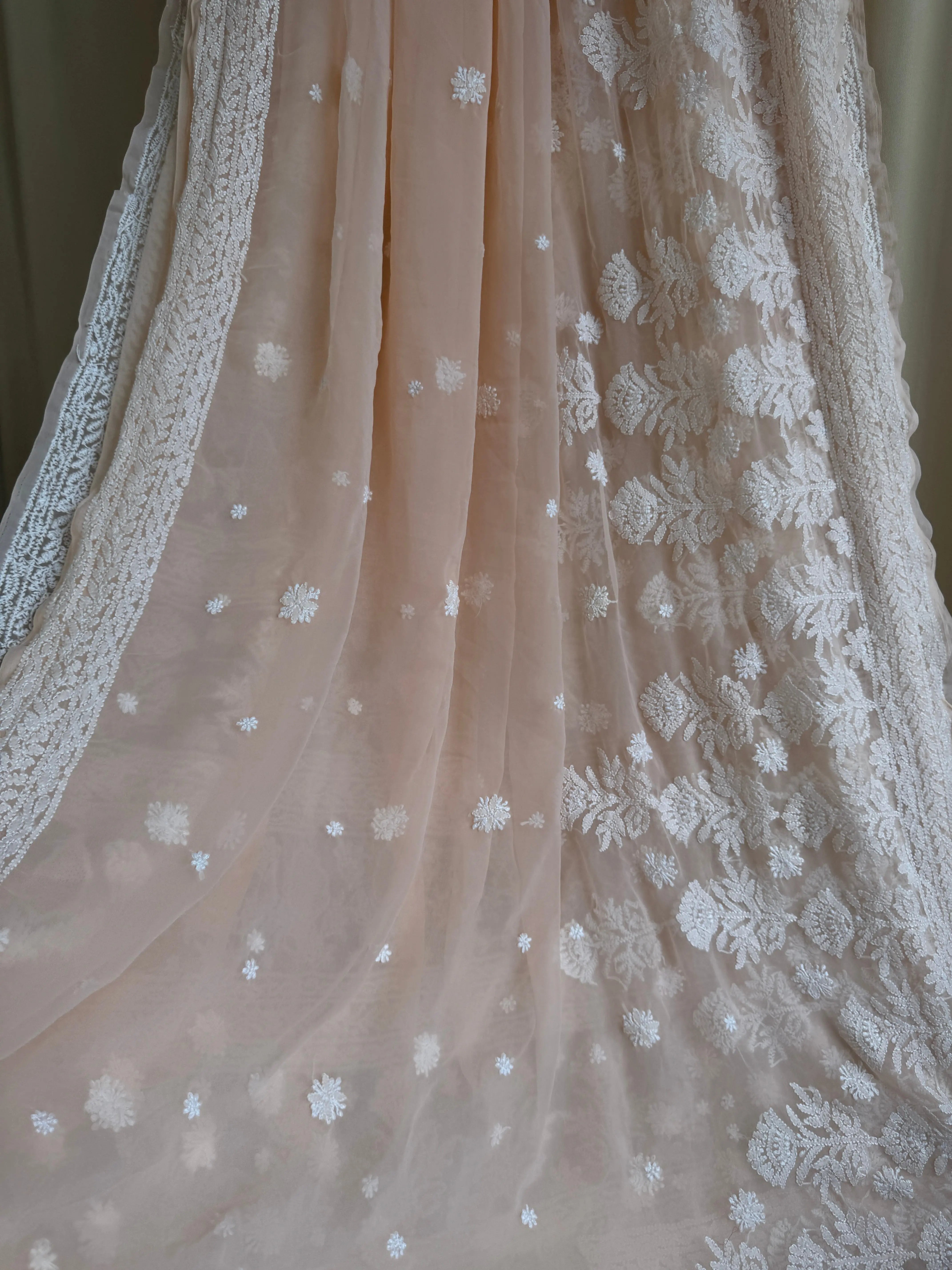 Georgette Chikankari saree in Peach ARIAA CHIKANKARI