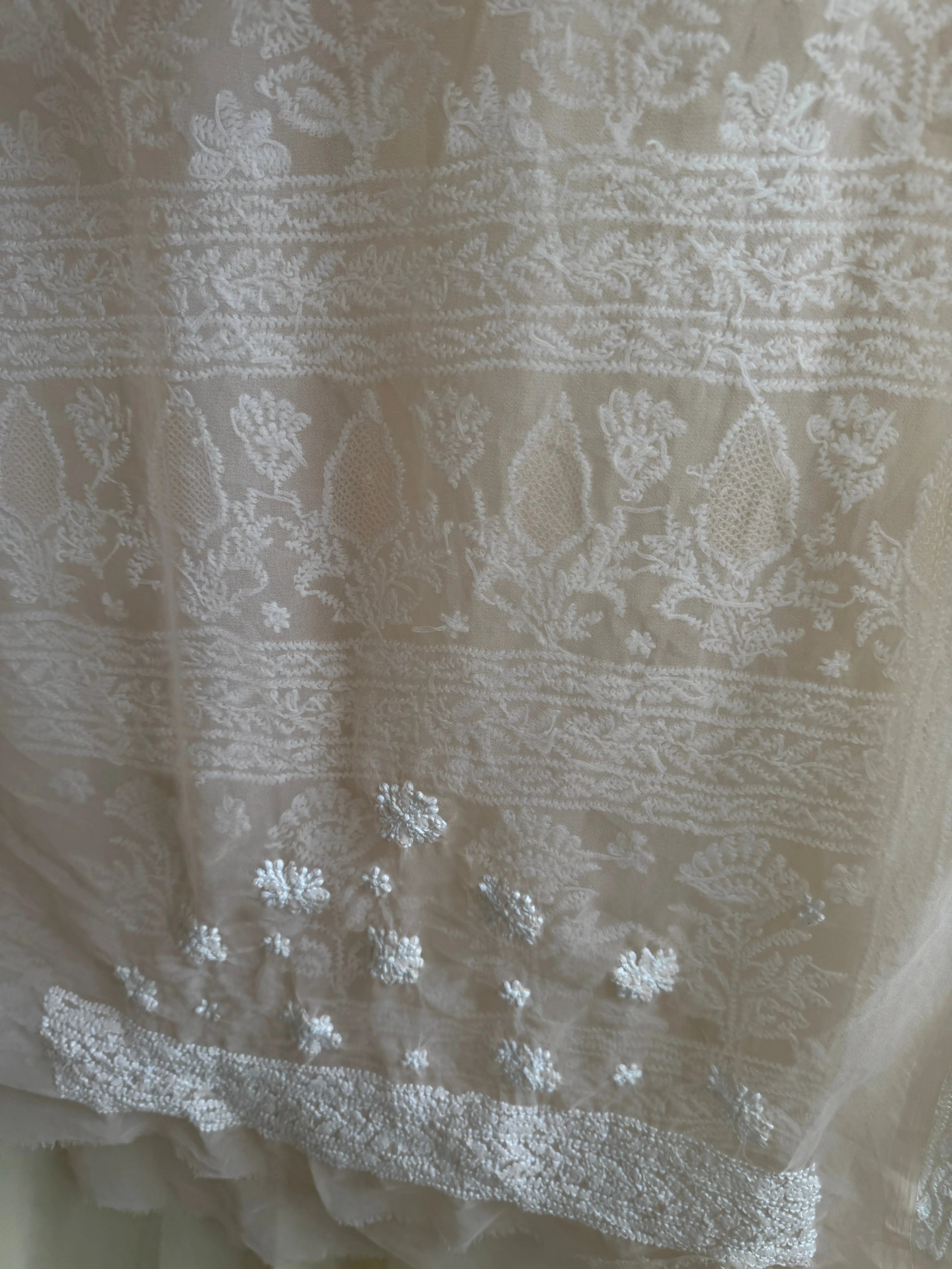 Georgette Chikankari saree in Peach ARIAA CHIKANKARI