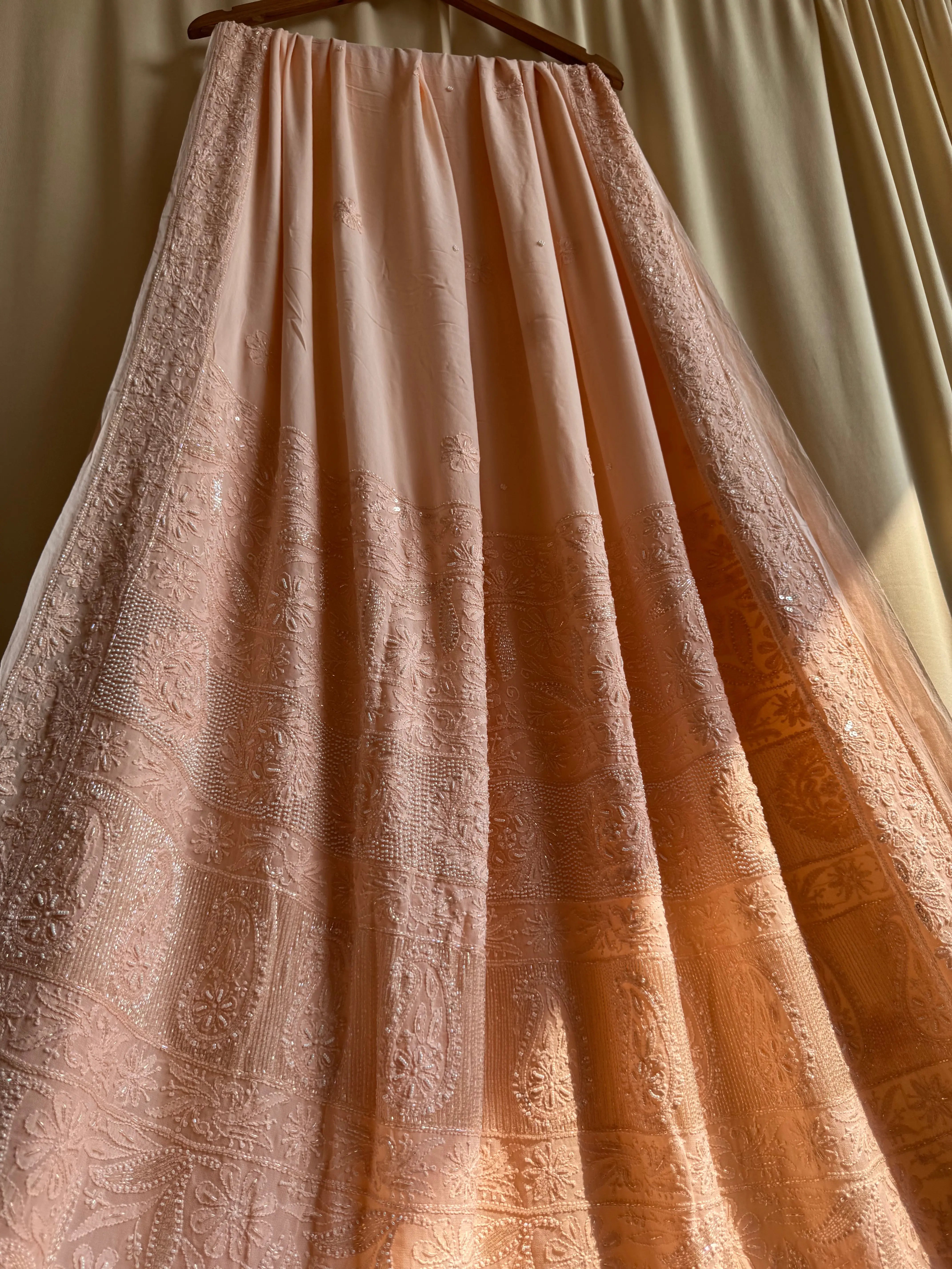 Viscose Peach Chikankari saree with Pearl embellishments ARIAA CHIKANKARI