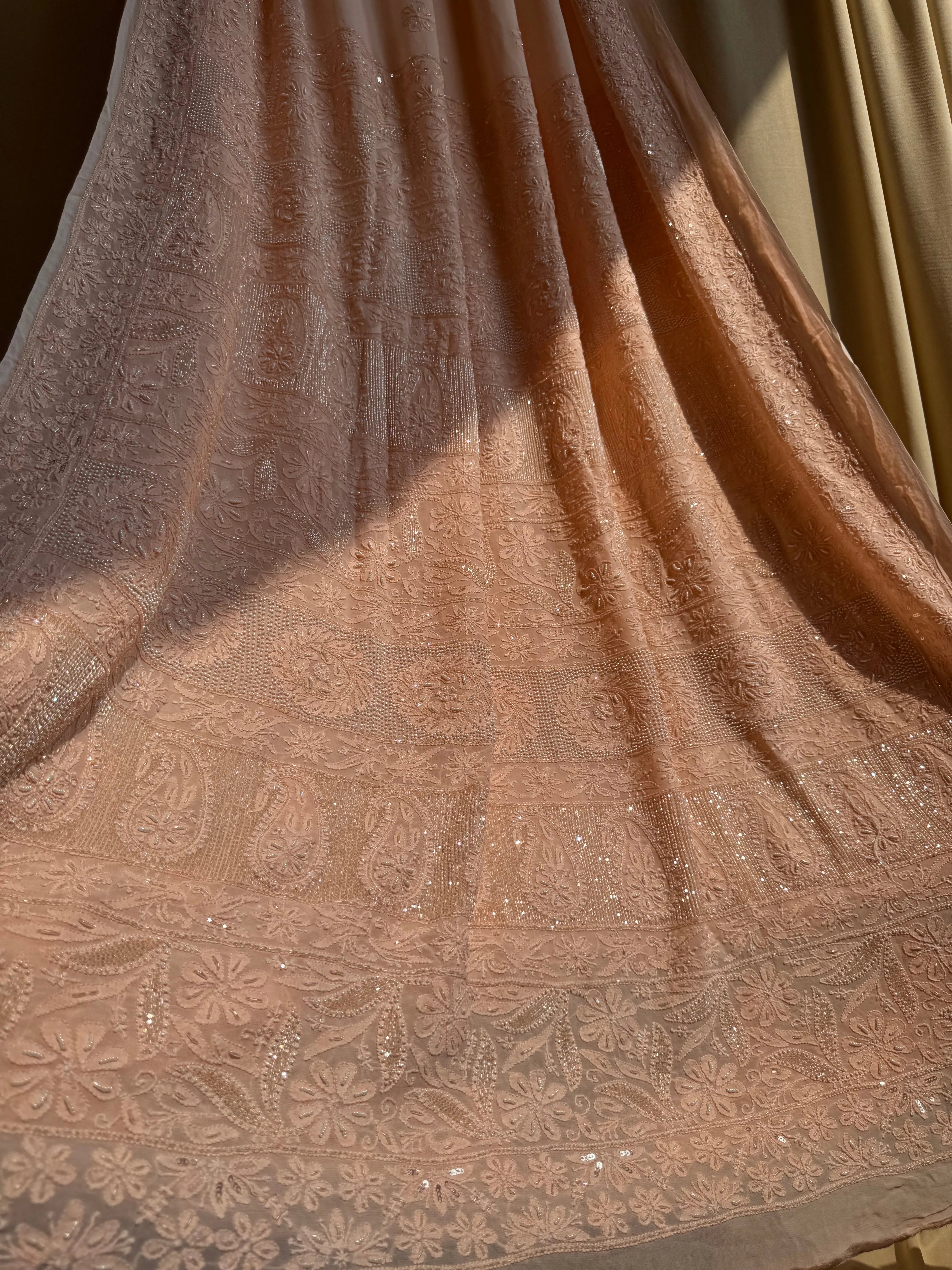 Viscose Peach Chikankari saree with Pearl embellishments ARIAA CHIKANKARI